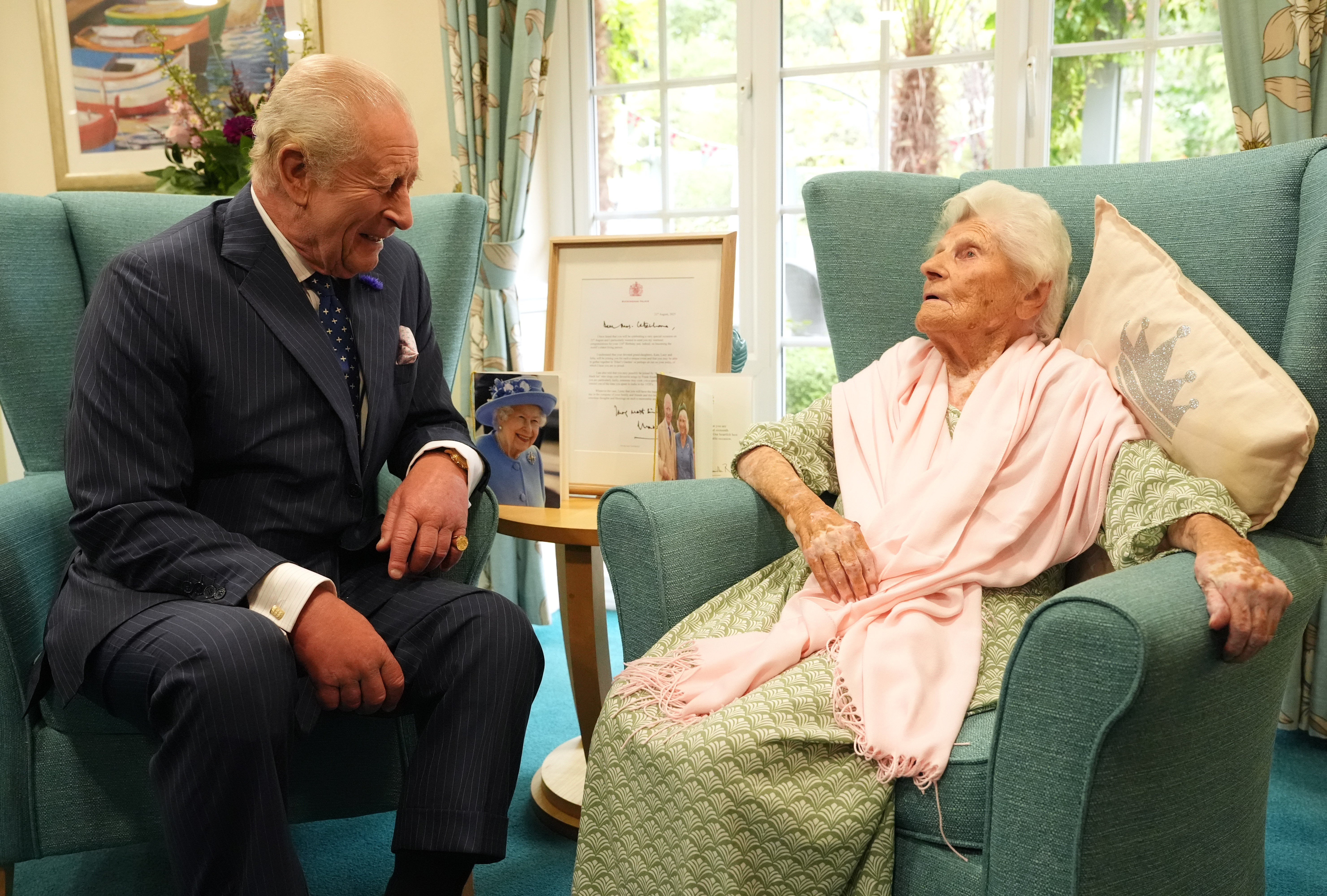 King Charles III meets the world’s oldest person, 116-year-old Ethel Caterham, at Hallmark Lakeview Care Home in Lightwater, Surrey