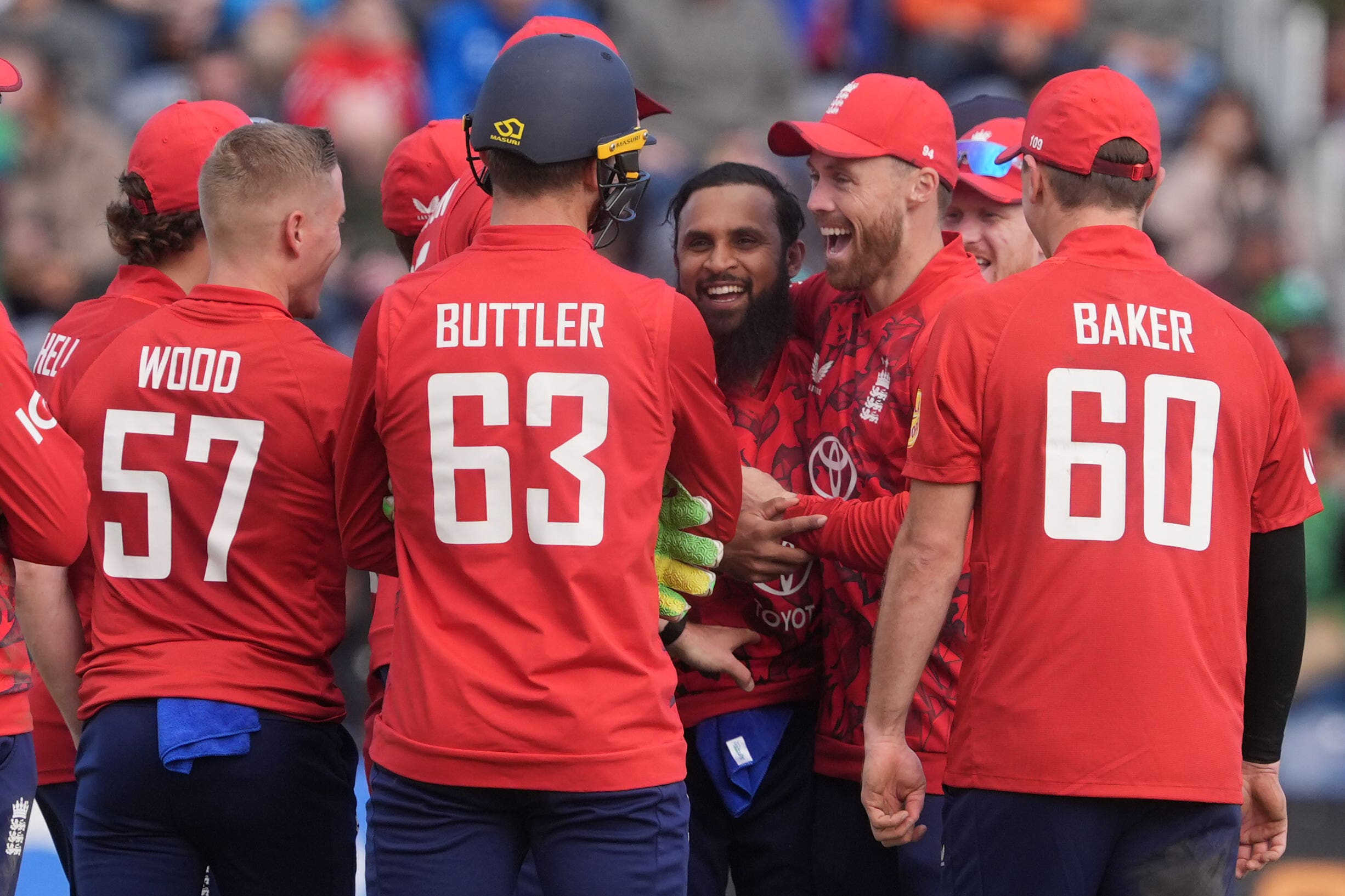 England’s Adil Rashid (fourth from right) celebrates with his team mates after trapping Ireland’s Barry McCarthy lbw during the third T20 against Ireland (Brian Lawless/PA).