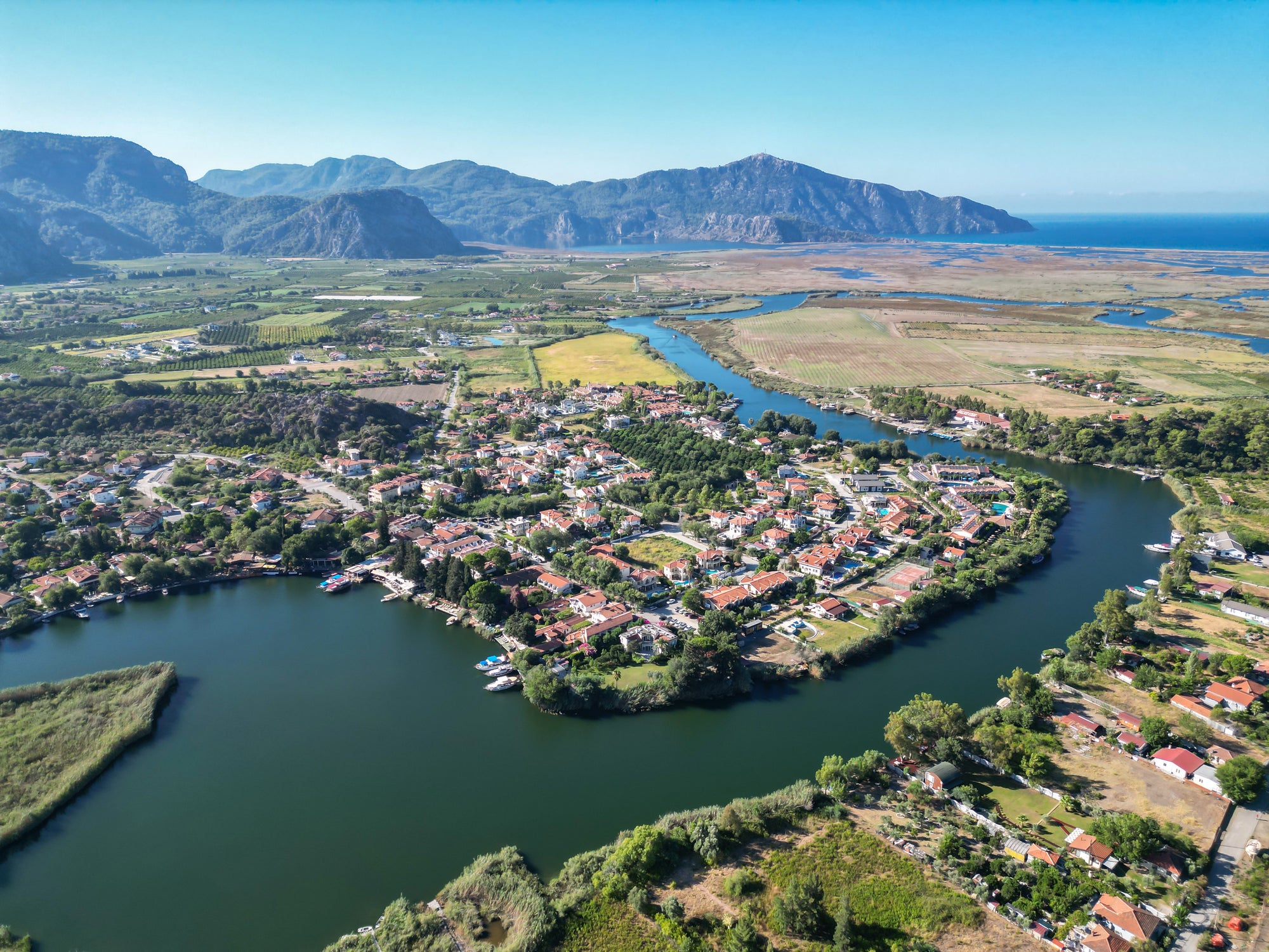 The town, along the banks of the snaking River Dalyan in Mugla Province, still has a local feel