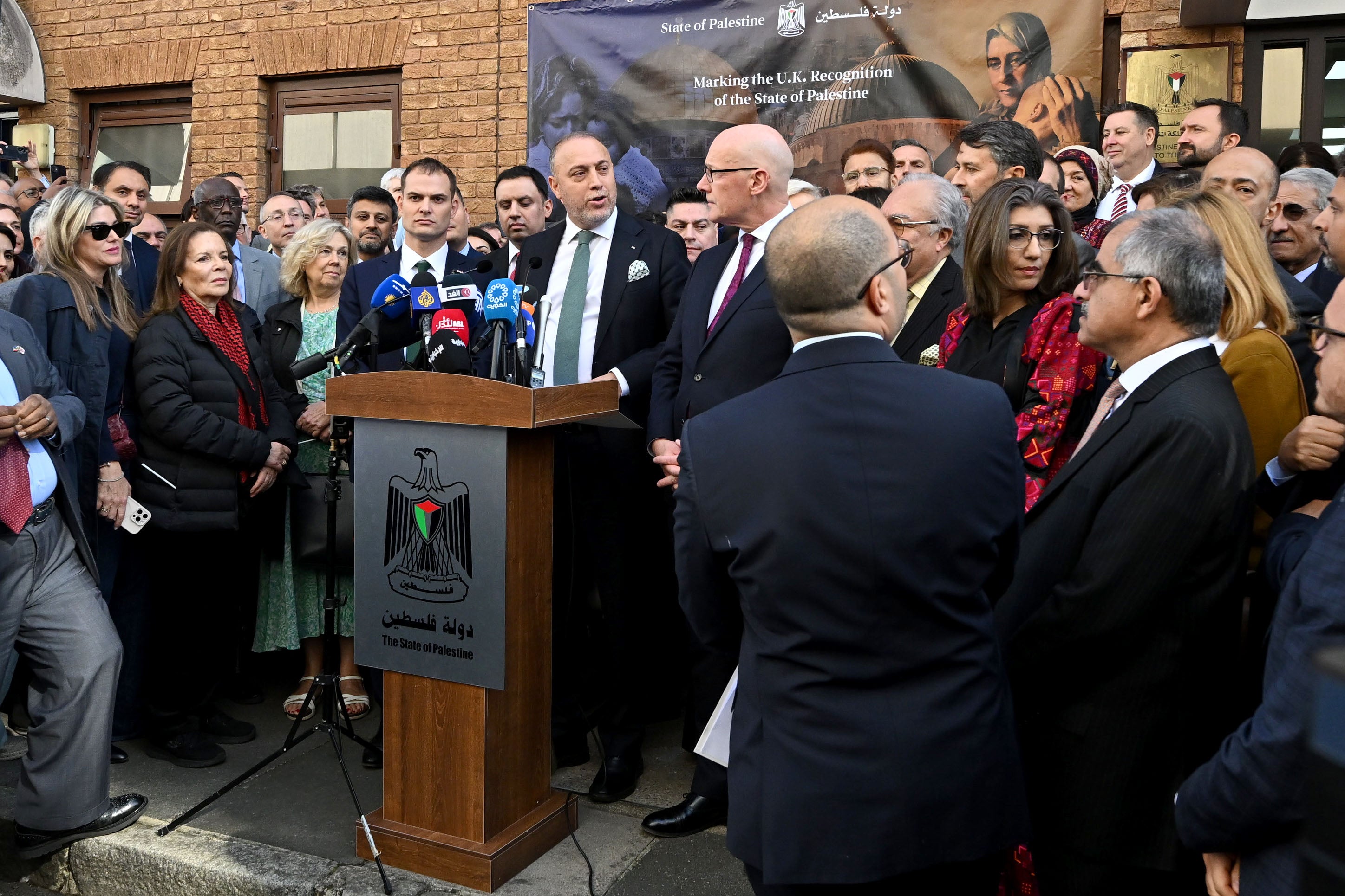 Husam Zomlot, the UK’s ambassador of the state of Palestine, speaks during the flag-raising ceremony to mark the recognition on Monday