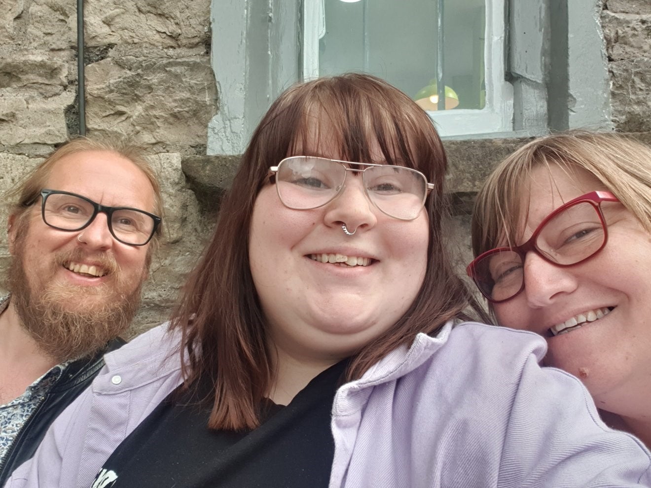 Zoe Nunn (centre), 20, with her parents, Mark Nunn, 52 and Louise Nunn, 49