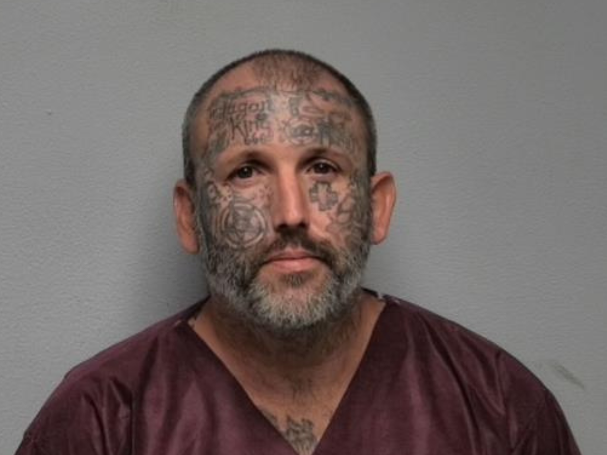 Tattoo-covered suspect accused of murdering mom and daughter served time for killing man and stuffing body in suitcase