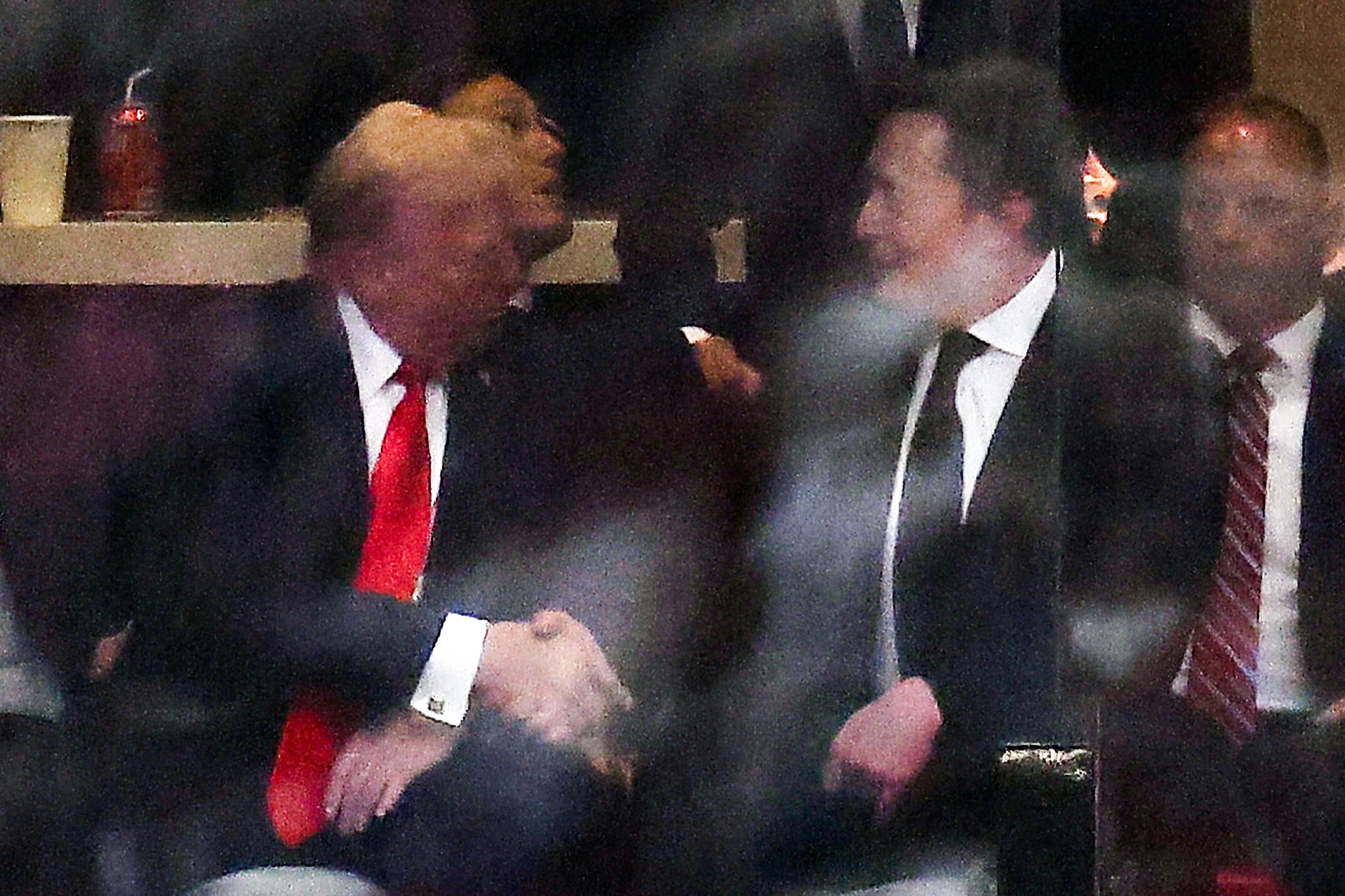 Trump appears unmoved by apparent Musk reconciliation at Charlie Kirk memorial