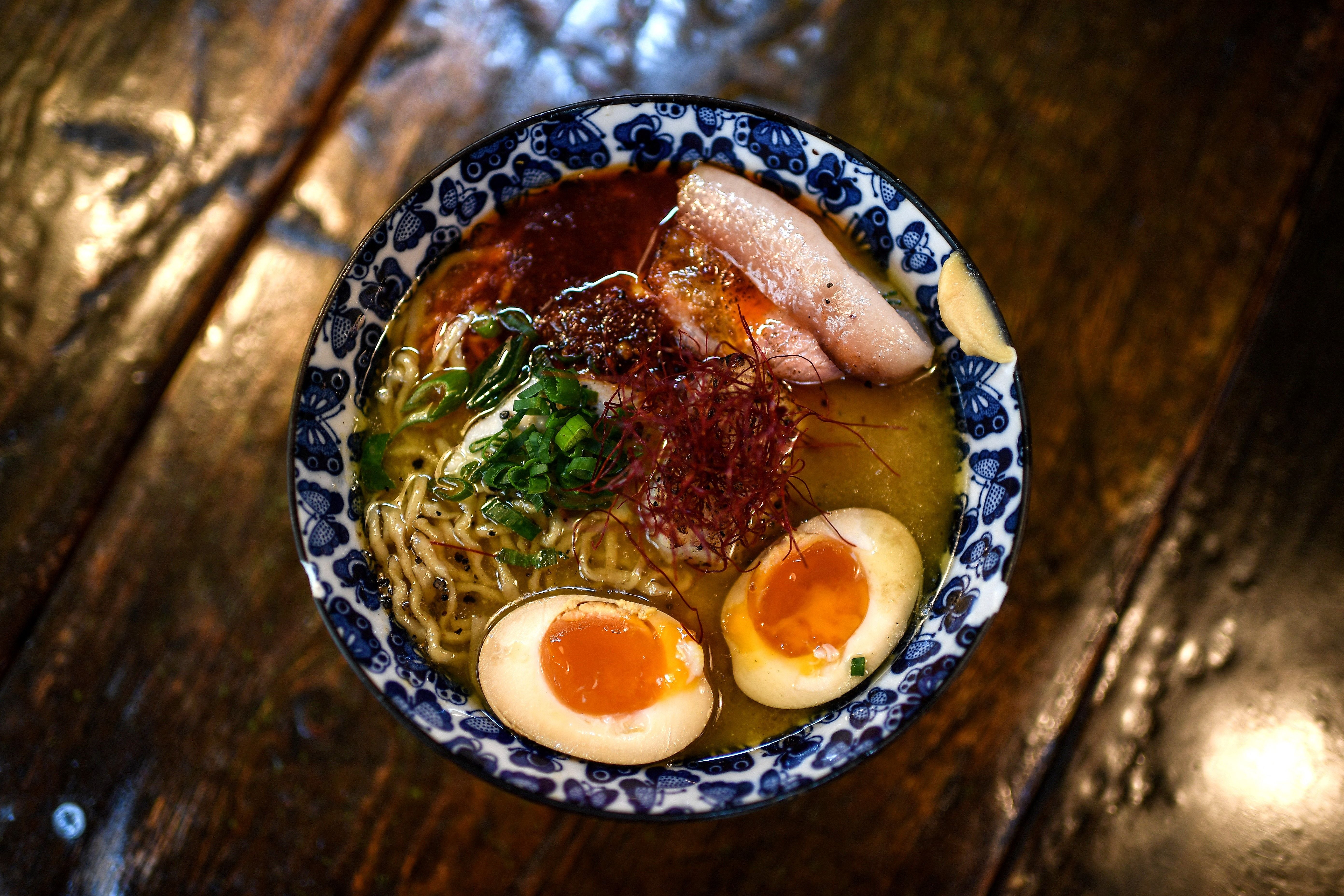 A bowl is ready to be served to customers having a meal at the Kodawari Tsukiji ramen restaurant