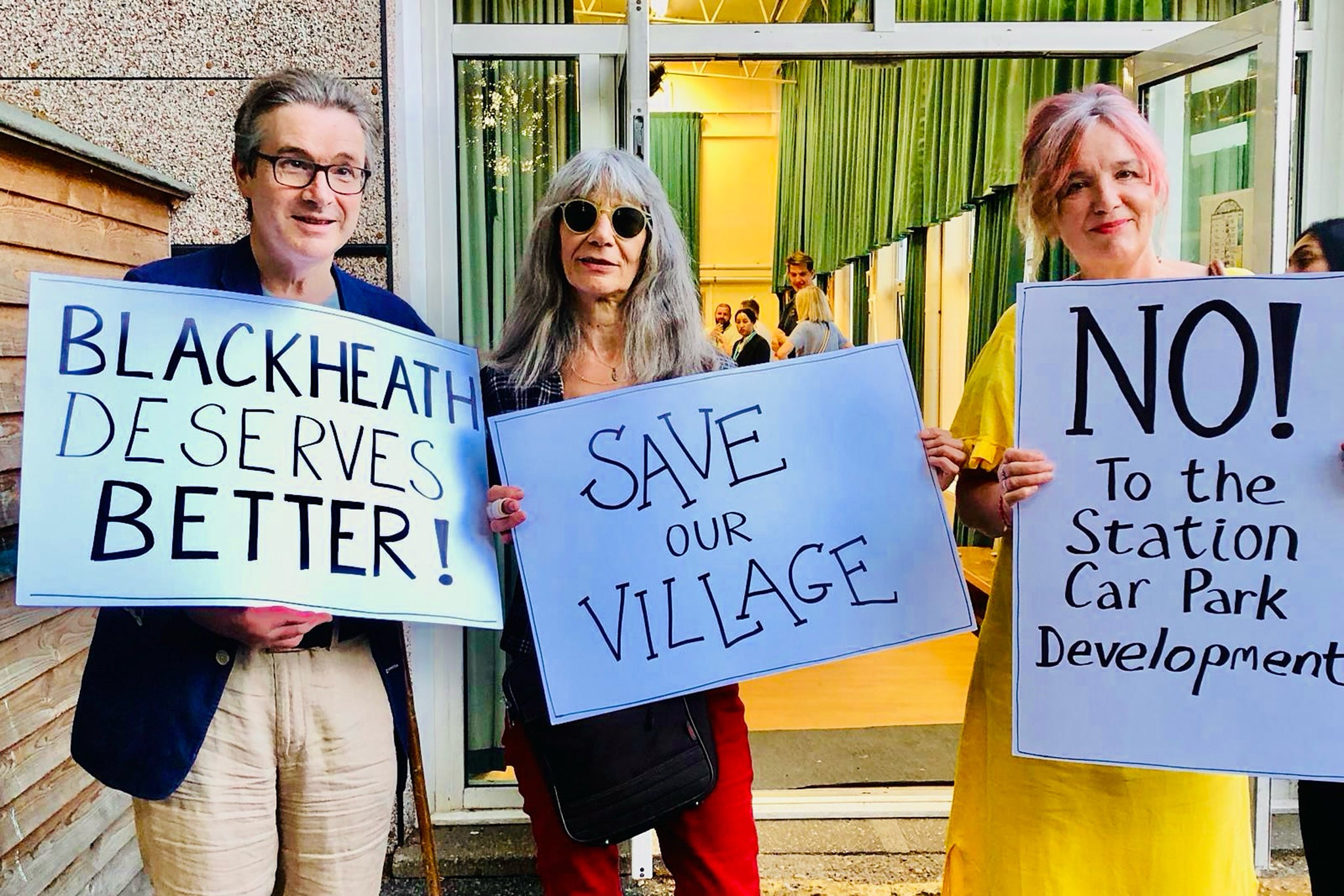 Blackheath residents Laurence Marron, Gill Abela and Wendy Rigg protest against the proposed development