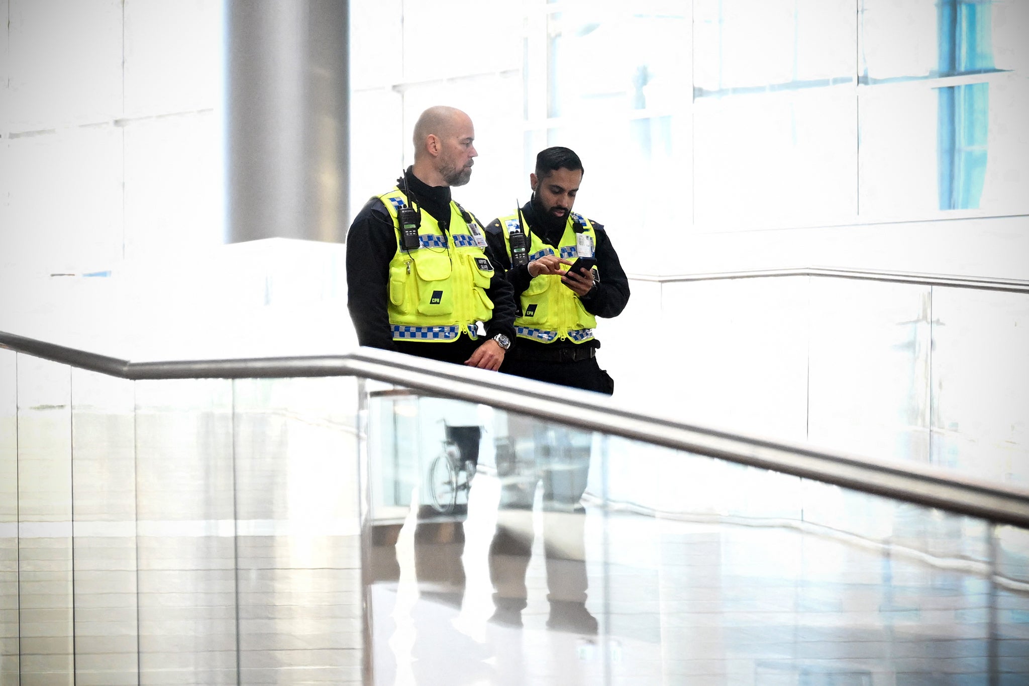 Security officers at Copenhagen airport, where an incursion of unidentified drones caused dozens of flights to be diverted or cancelled last week