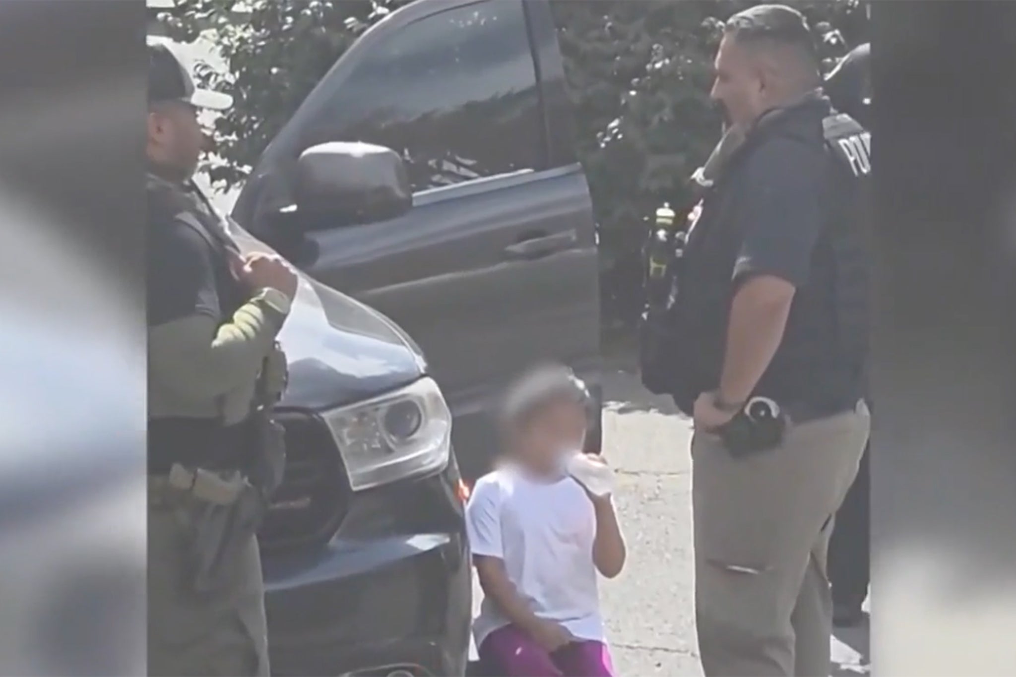 ICE agents were filmed detaining a girl as they tried to arrest her father