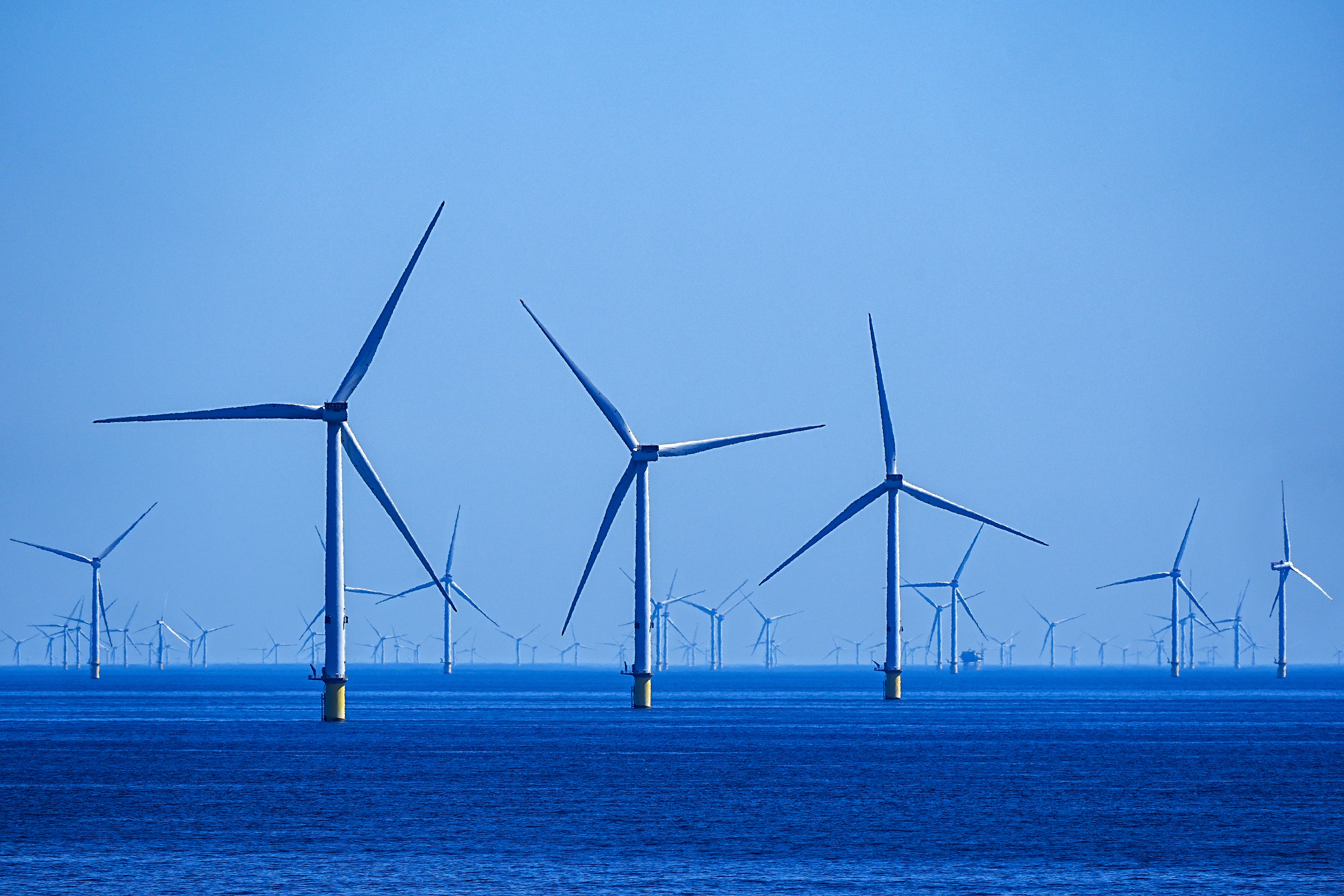 A battery can benefit from gults of cheap wind energy, driving prices down to 10 pence per unit (Peter Byrne/PA)