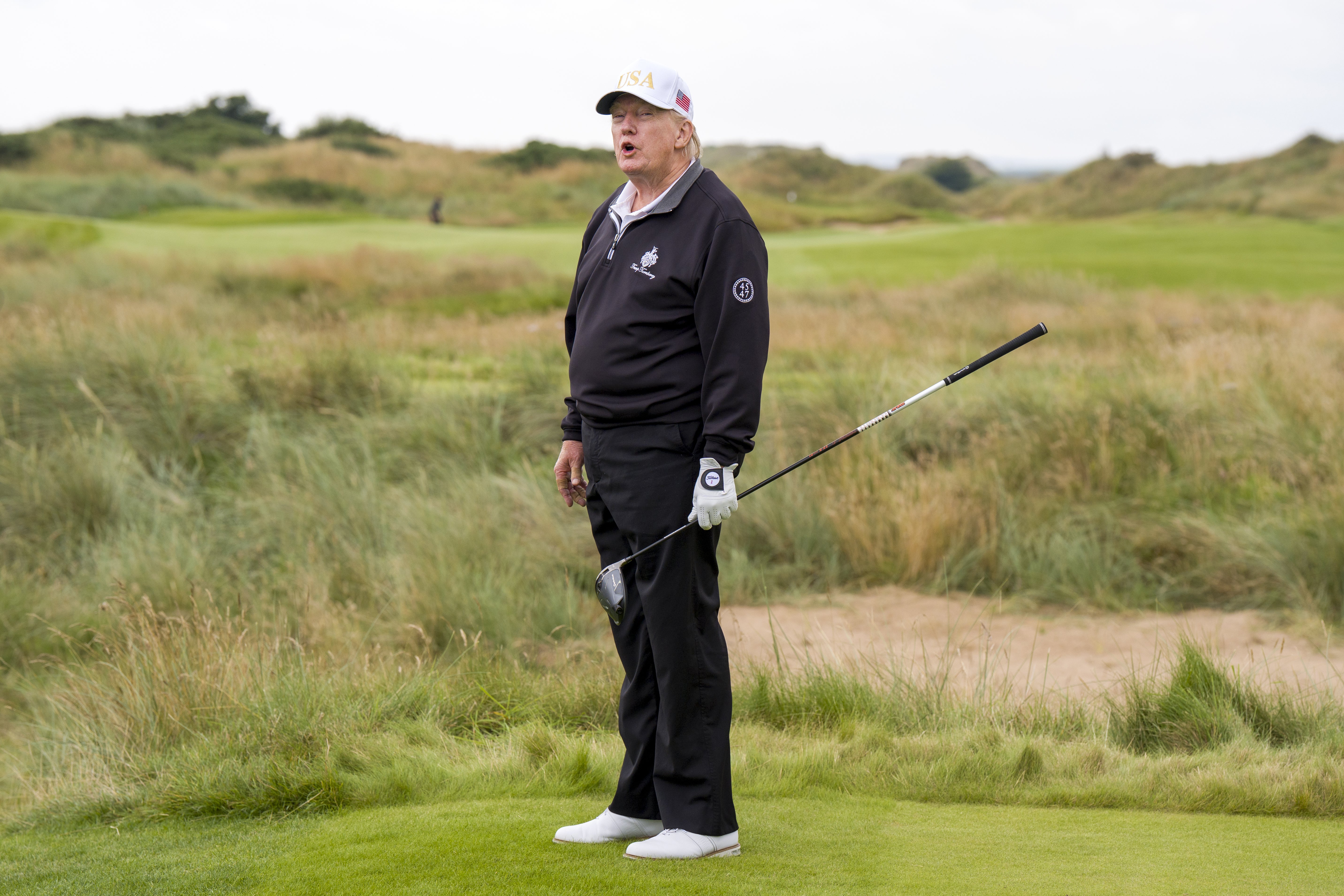 Trump is a big golf fan and will be at the Ryder Cup on Friday (Jane Barlow/PA)