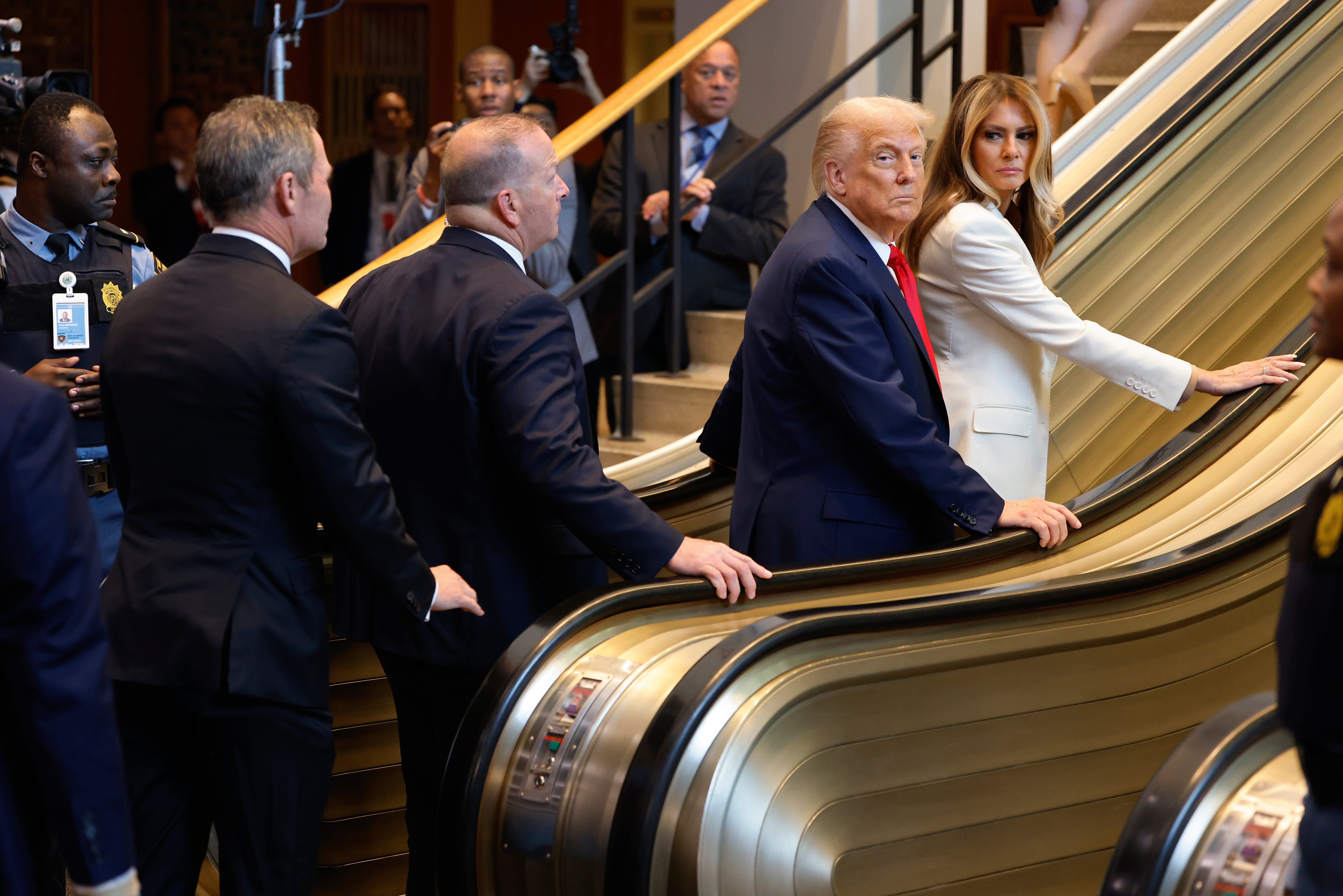 President Donald Trump and first lady Melania Trump ascend UN escalator ...