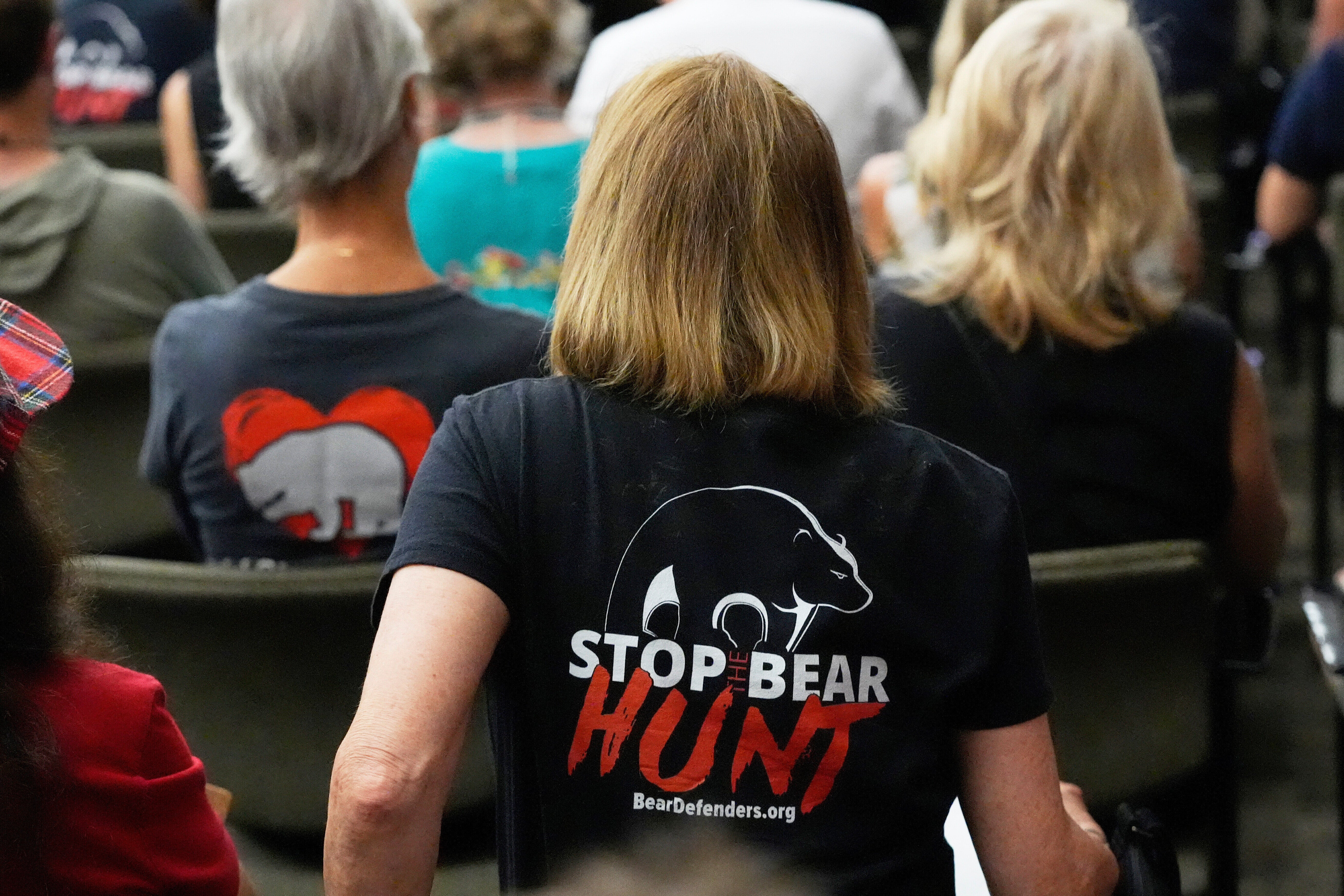 Citizens attending a Florida Fish & Wildlife Commission hearing about proposed bear hunting earlier this year