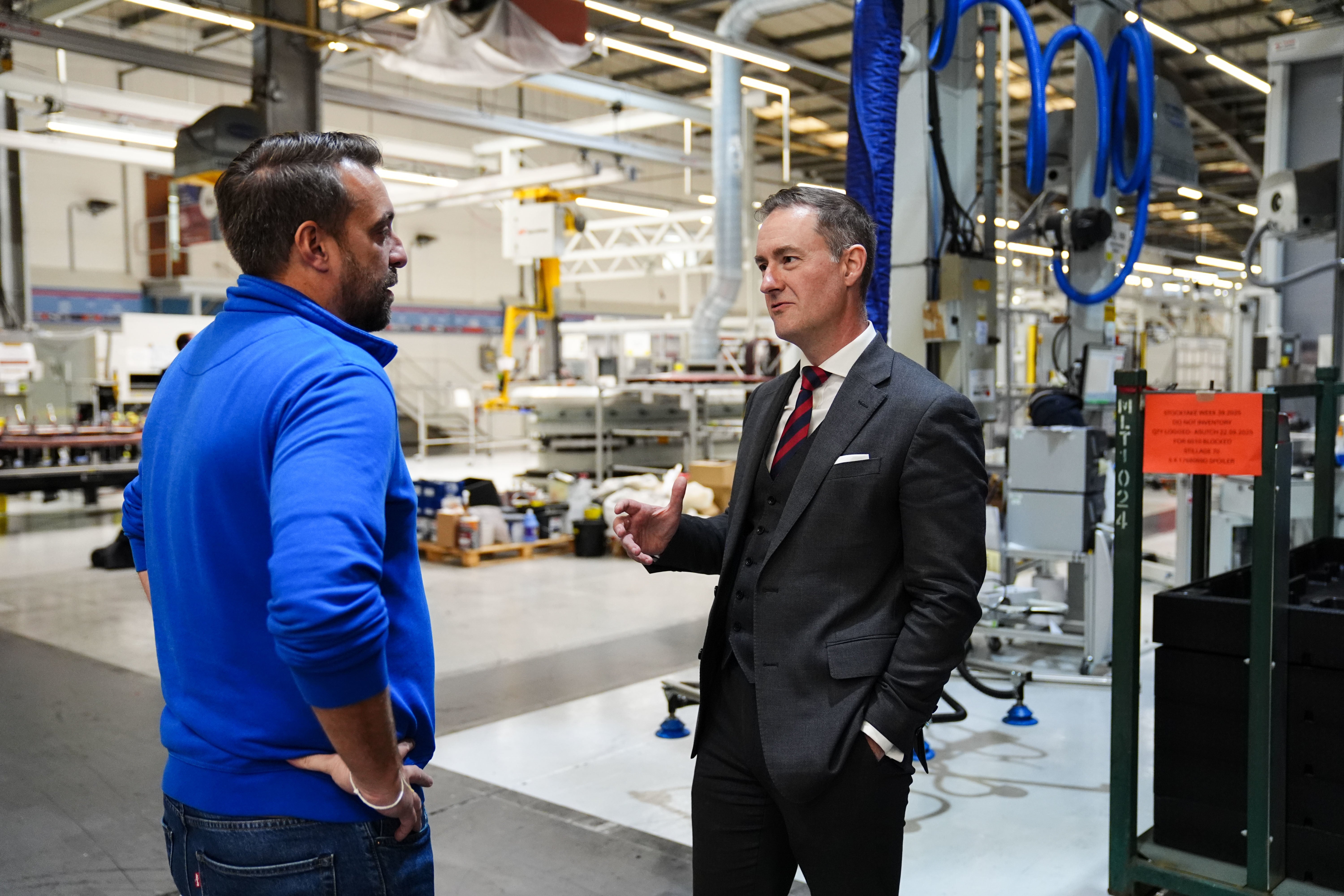 MP Chris McDonald talks to workers at Jaguar Land Rover after the cyber attack earlier this month
