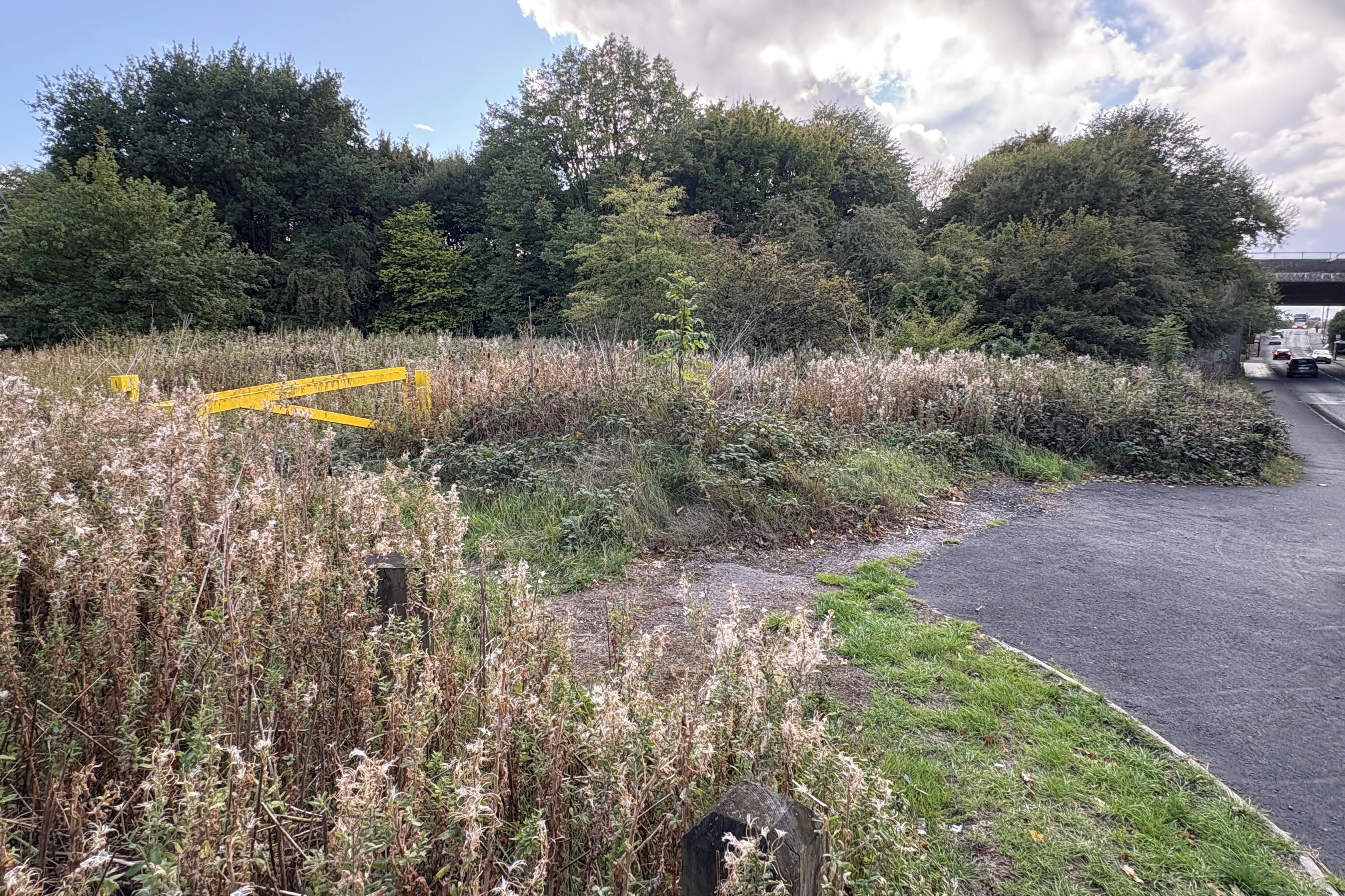 A previously sealed-off area of grassland near Tame Road in Oldbury, West Midlands, as police are investigating the reported rape of a woman (Matthew Cooper/PA)
