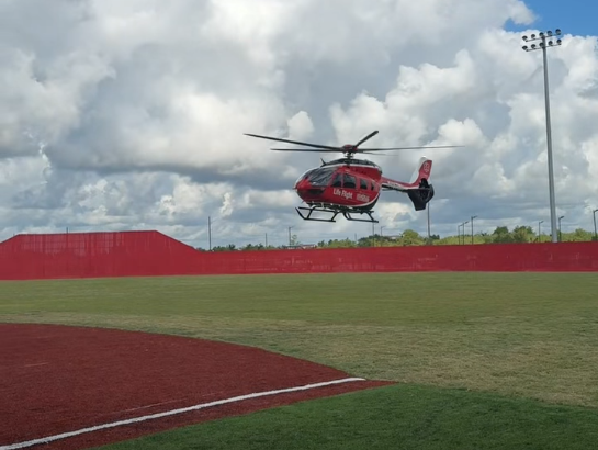 A 27-year-old baseball coach is airlifted to hospital in Katy, Texas after gunfire interrupted a game on Sunday