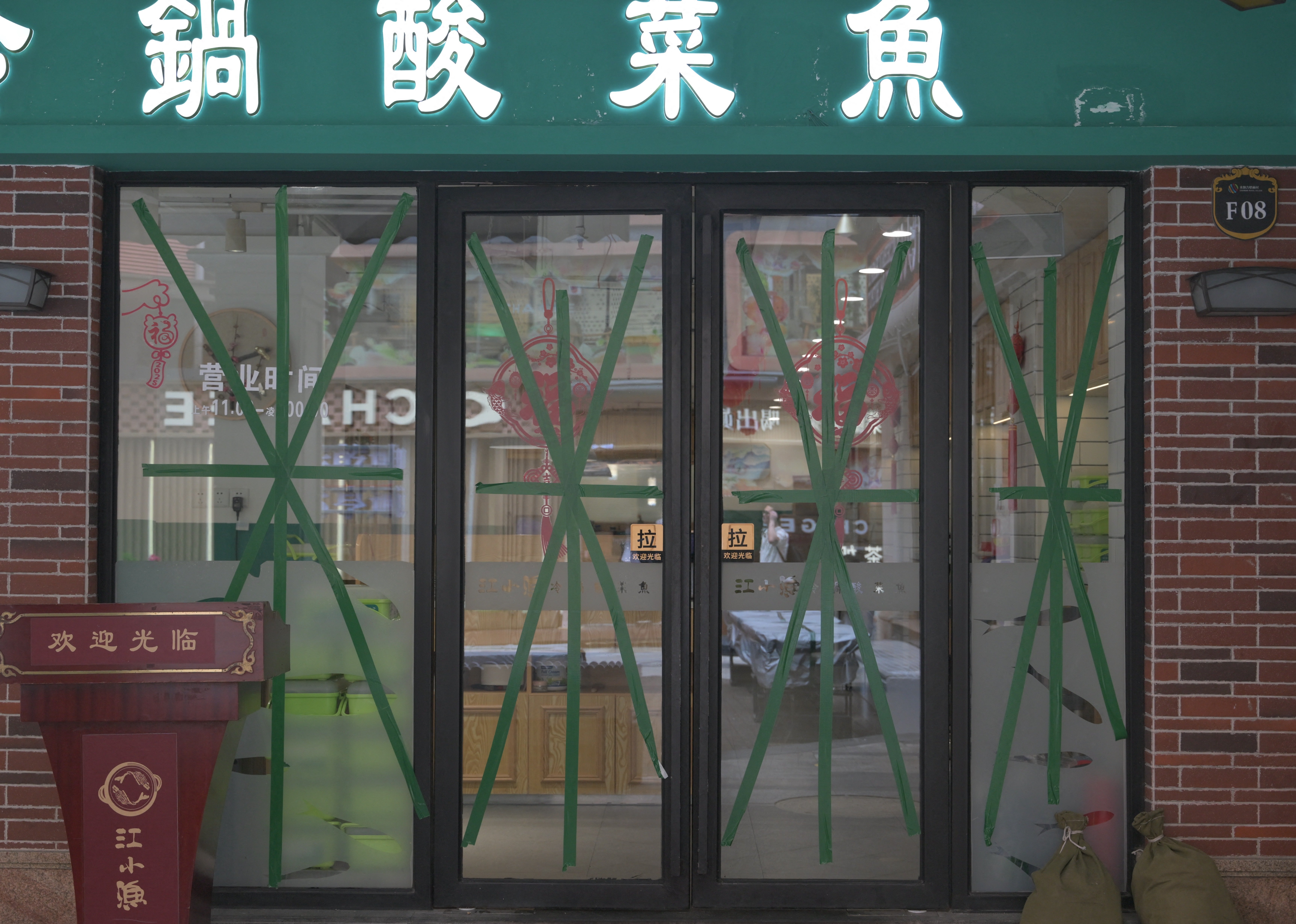 A restaurant with tapped windows in Zhuhai area of Guangdong province, China