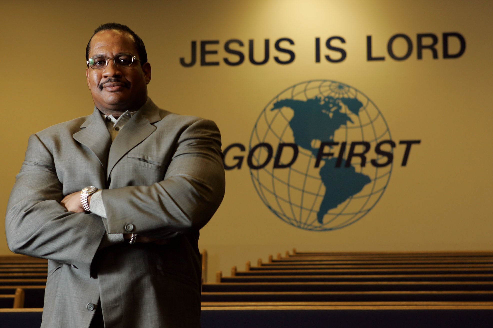 Pastor Patrick Wooden Sr. is seen in the sanctuary of the Upper Room Church of God in Christ in Raleigh, N.C.