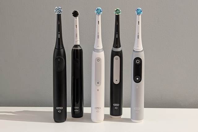 <p>The Oral-B iO2 (left) is the newest and cheapest electric toothbrush in the premium range</p>