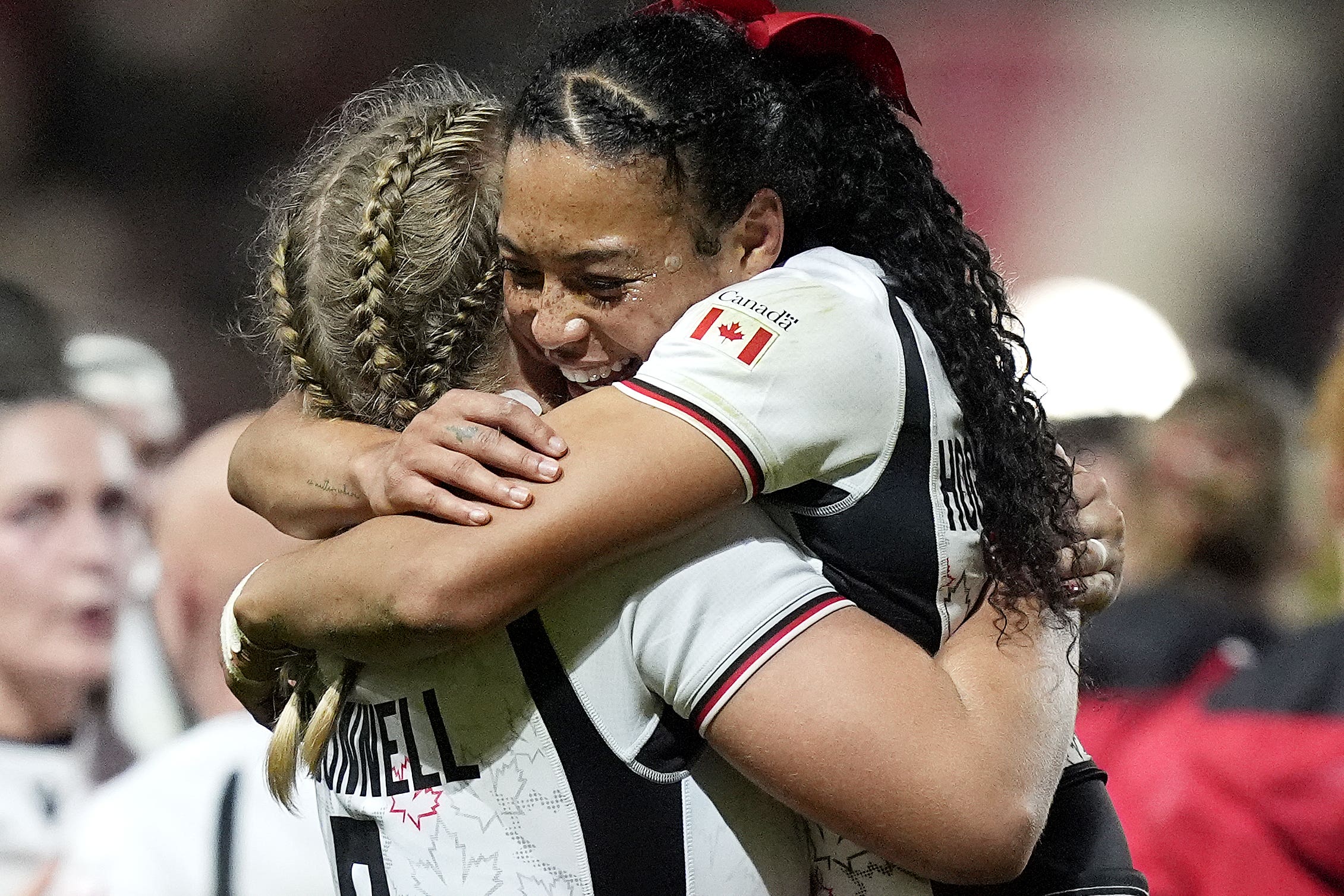 Asia Hogan-Rochester (right) celebrated Canada’s World Cup semi-final win over New Zealand (Andrew Matthews/PA)