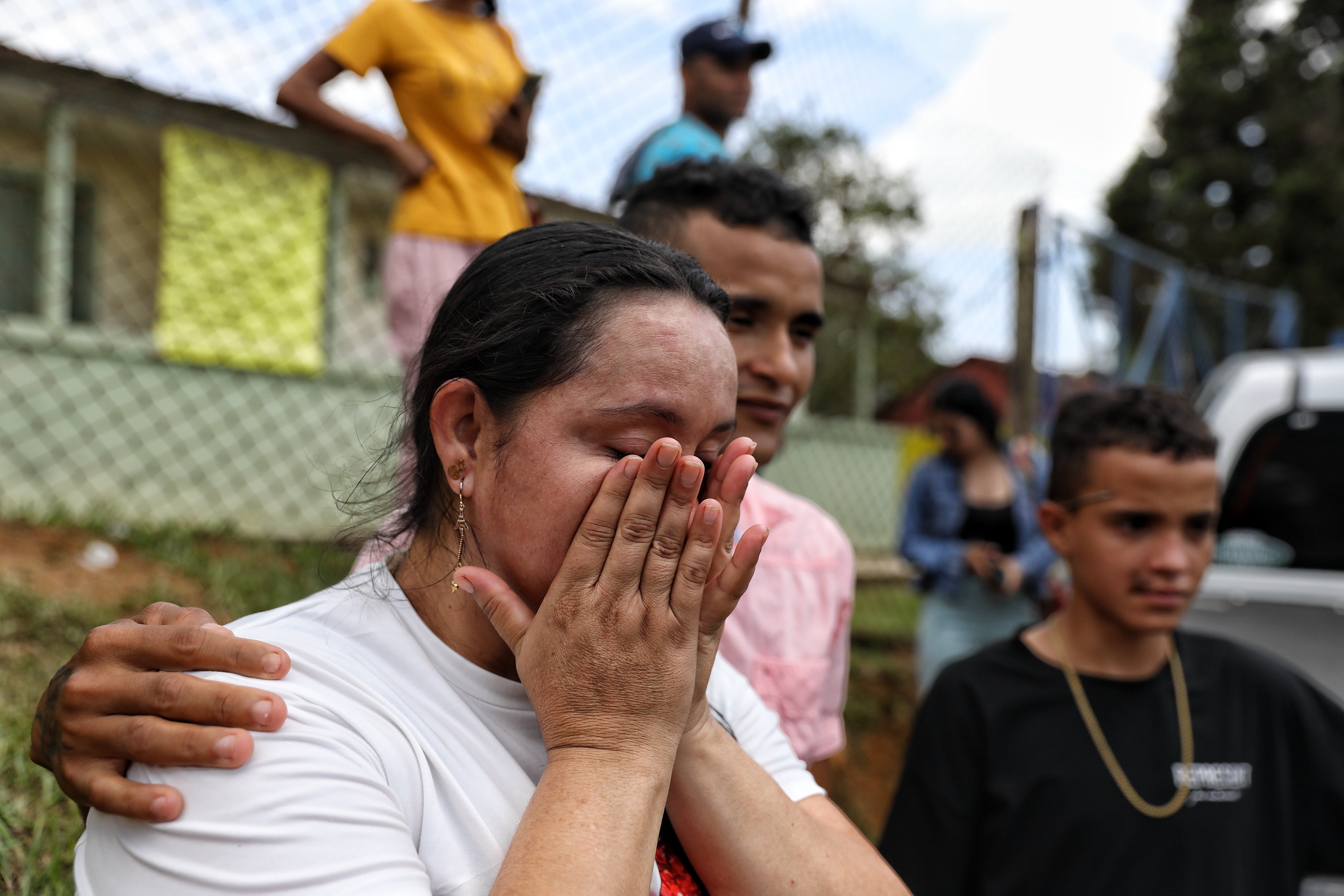 Yuliana Andrea Agudelo, mother of miner Sebastian Agudelo, reacts upon hearing that her son was rescued from a collapsed gold mine