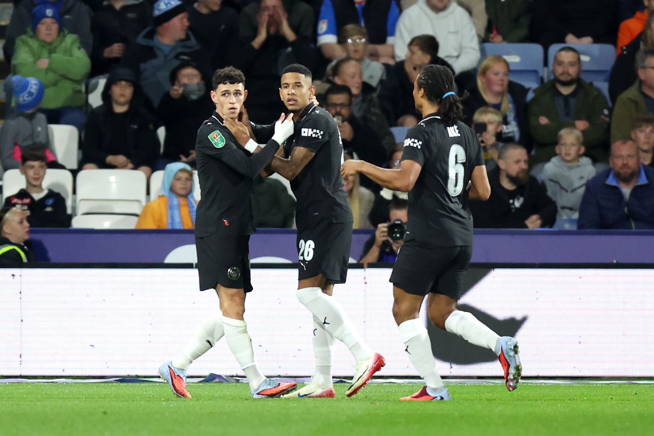 Phil Foden and Savinho ease Man City to victory over Huddersfield in Carabao Cup
