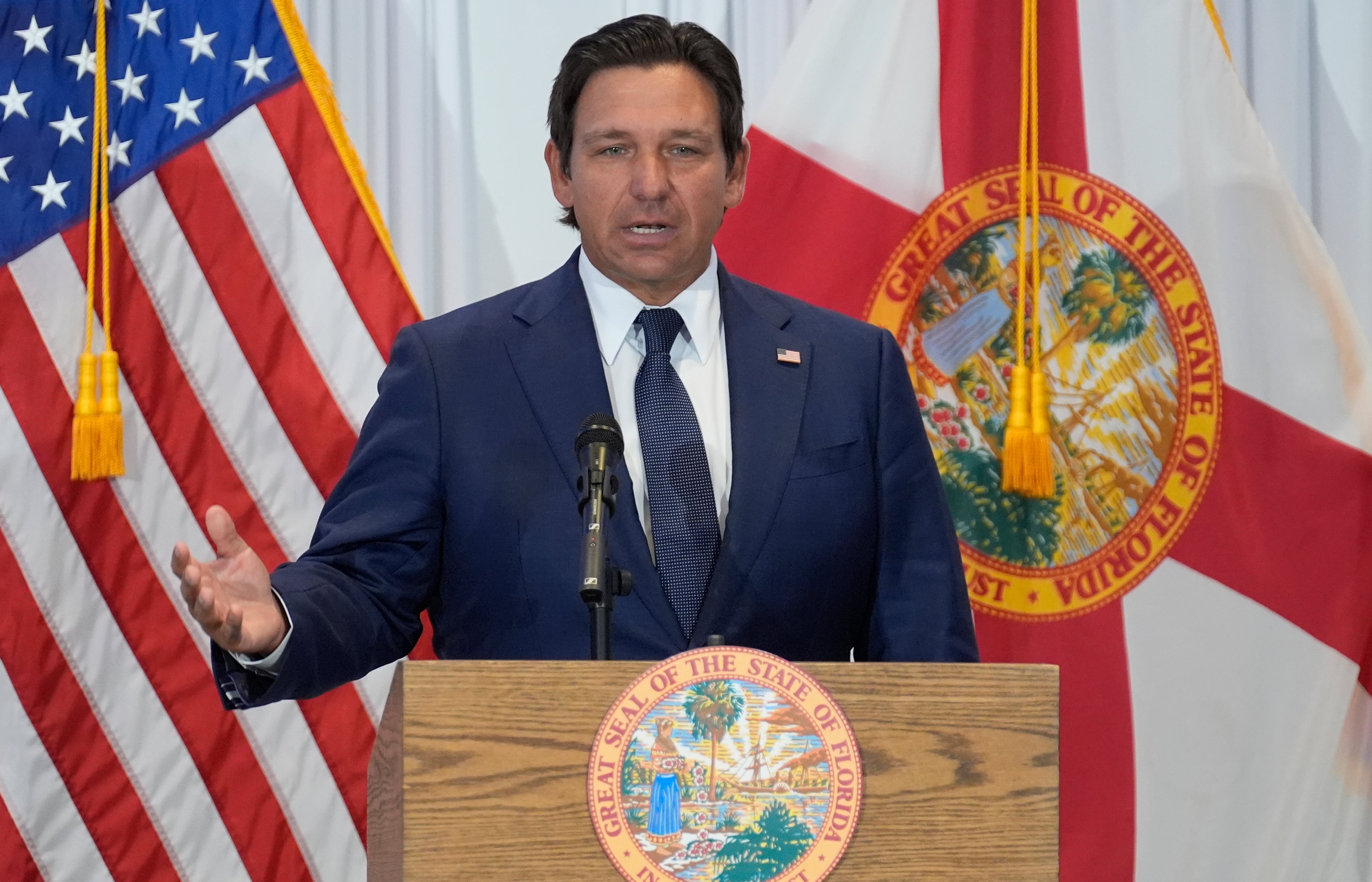 Governor Ron DeSantis said messages from across the political spectrum has been removed in compliance with the new order against artwork at intersections and crosswalks