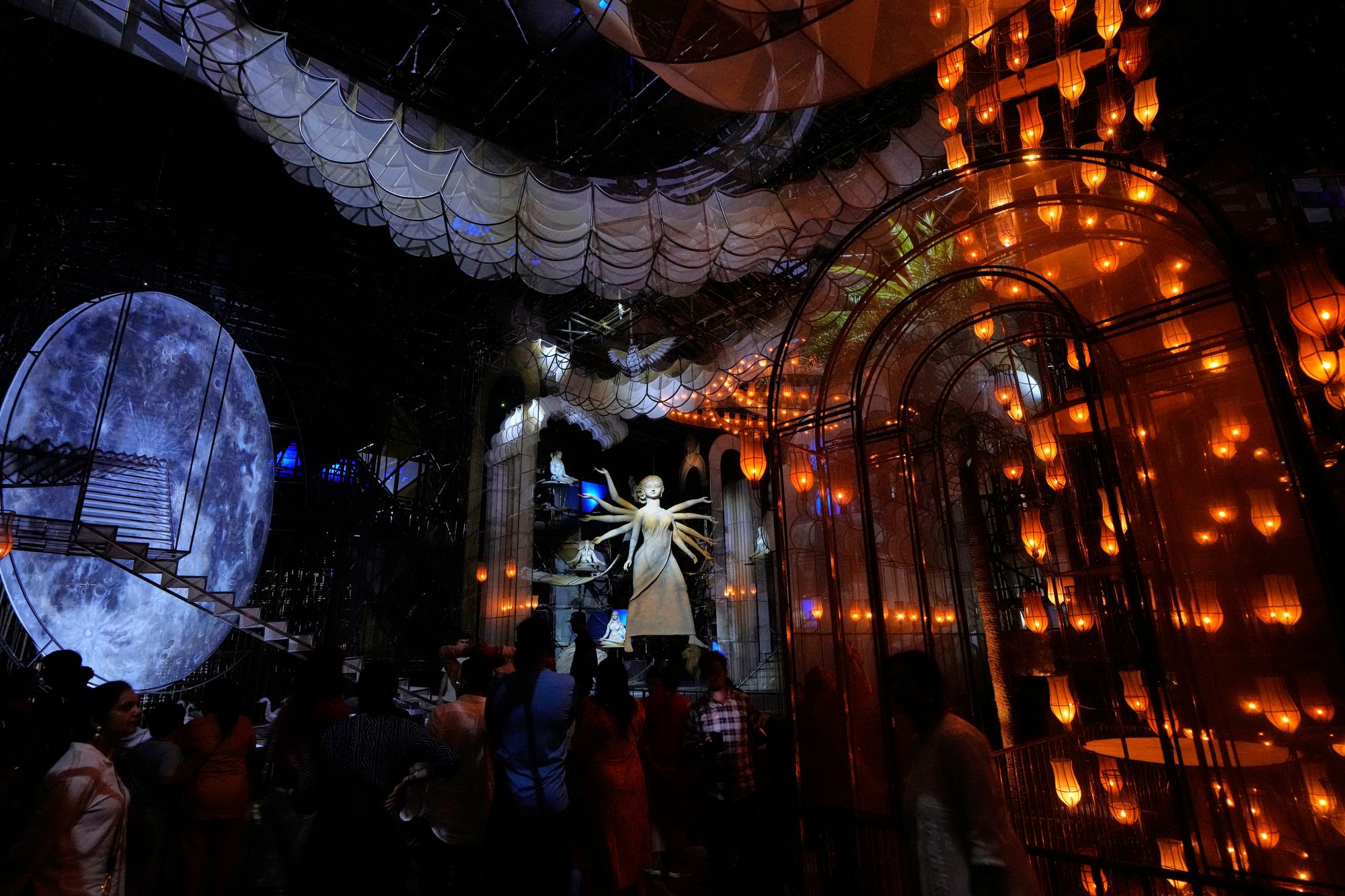 People throng a temporary worship venue of Hindu goddess Durga ahead of Durga Puja in Kolkata, India, on 22 September 2025