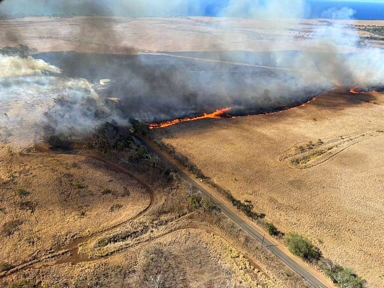 A wildfire in Maui as officials on the Hawaiian island evacuate homes