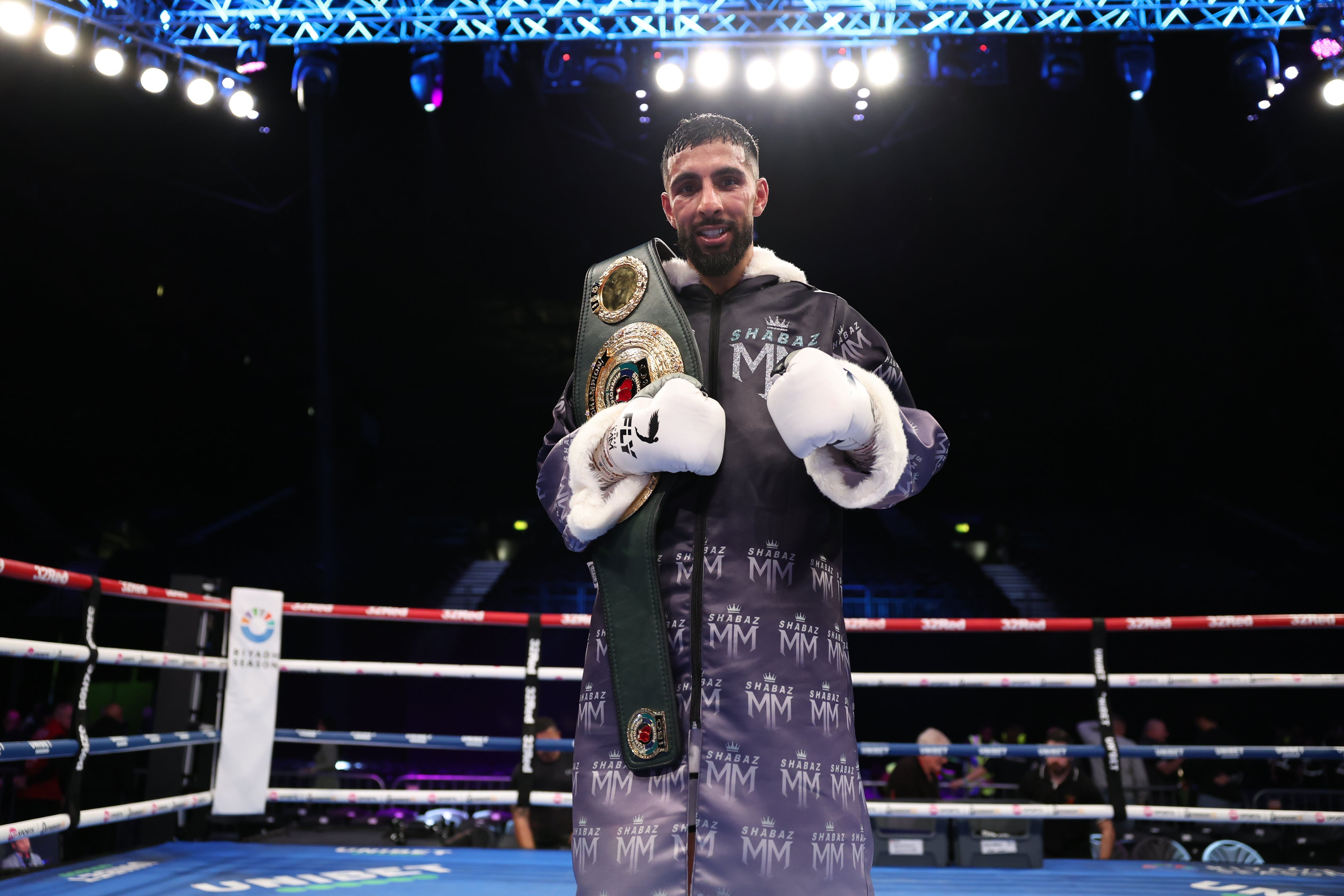 Shabaz Masoud poses with his IBO world title after defeating Liam Davies