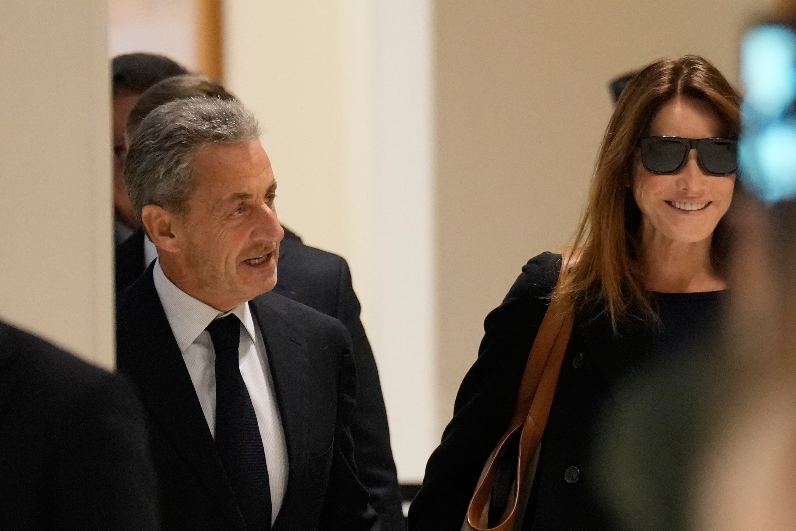 Sarkozy was accompanied by his wife, Carla Bruni-Sarkozy, in court on Thursday
