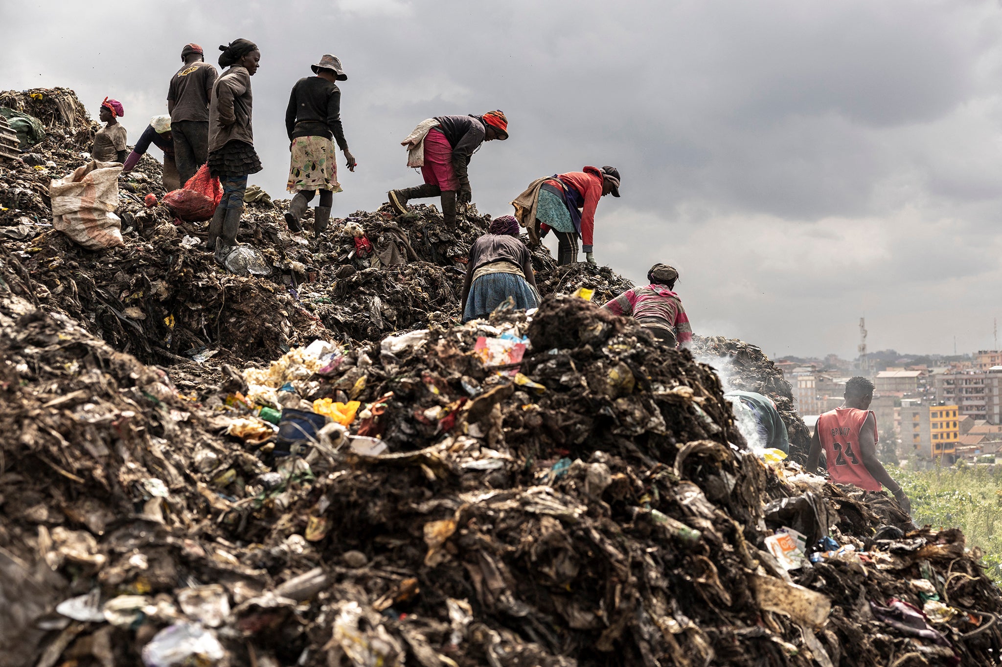 An estimated 46,000 waste pickers come to sites like Dandora in Nairobi every day, where they typically spend 12 hours per day looking for things to sell