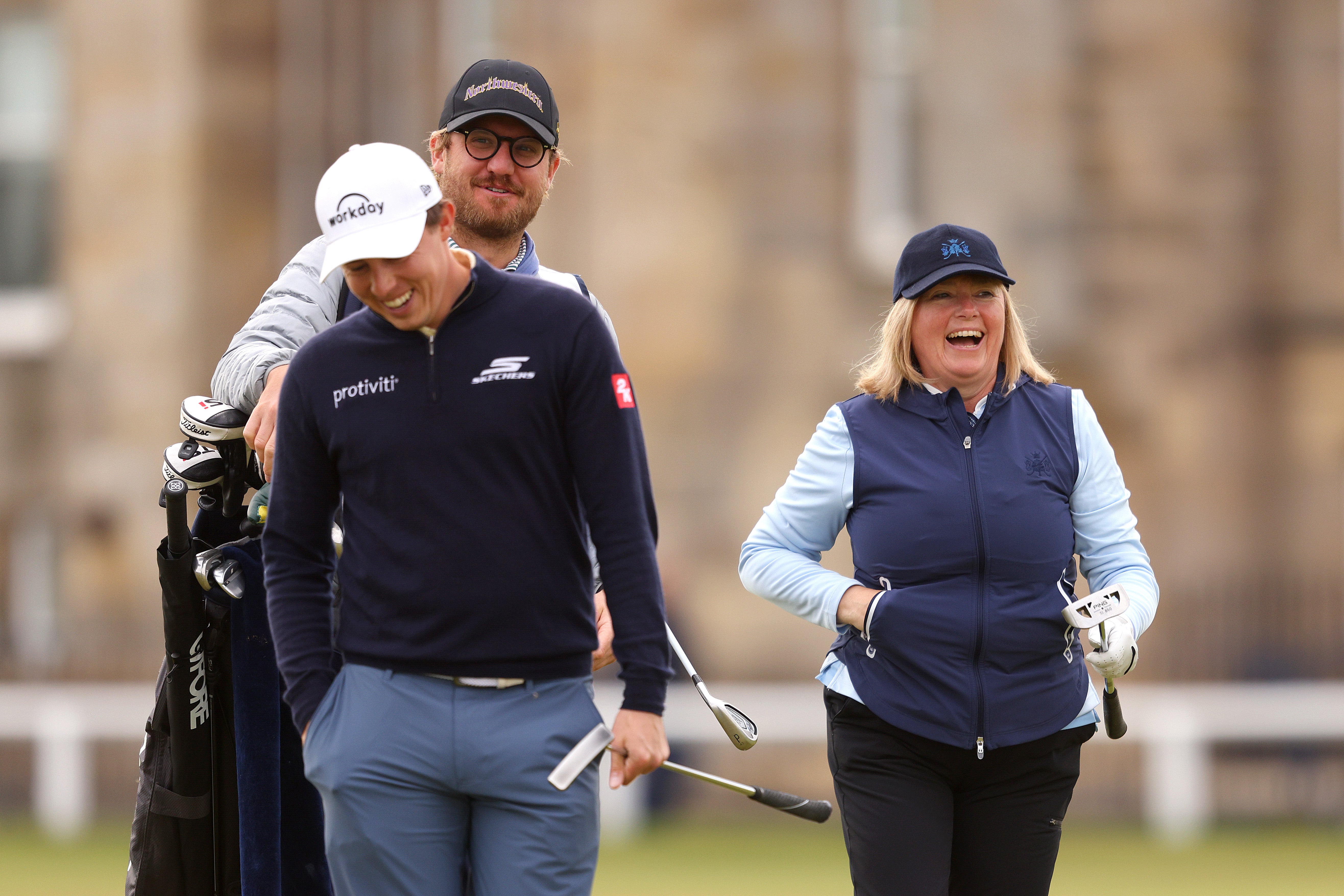 Matt Fitzpatrick of England laughs with his mother, Sue Fitzpatrick, at the Old Course at St Andrews