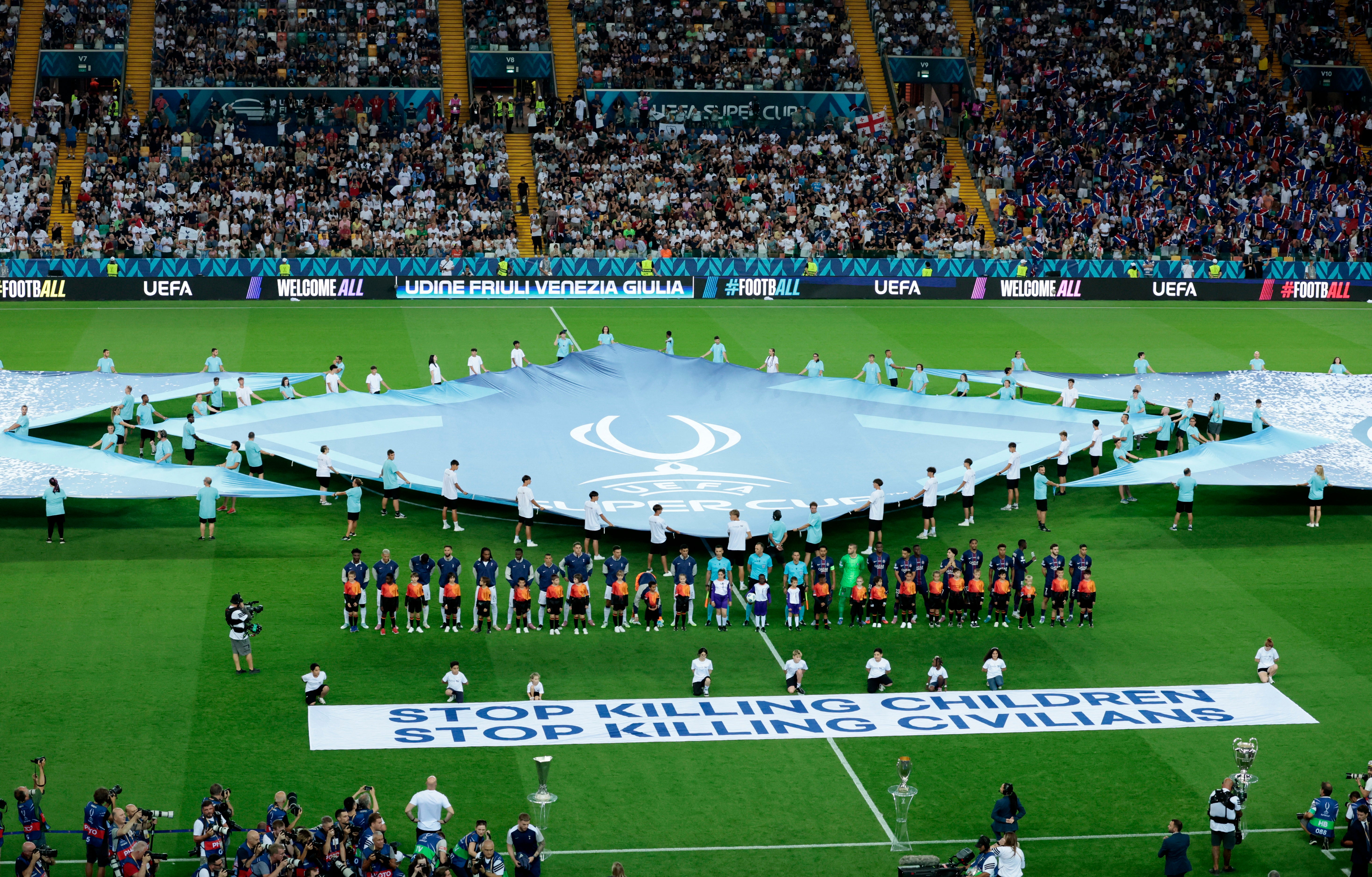 Banners reading ‘Stop killing children. Stop killing civilians’ were displayed before the Uefa Super Cup match between Tottenham and PSG last month