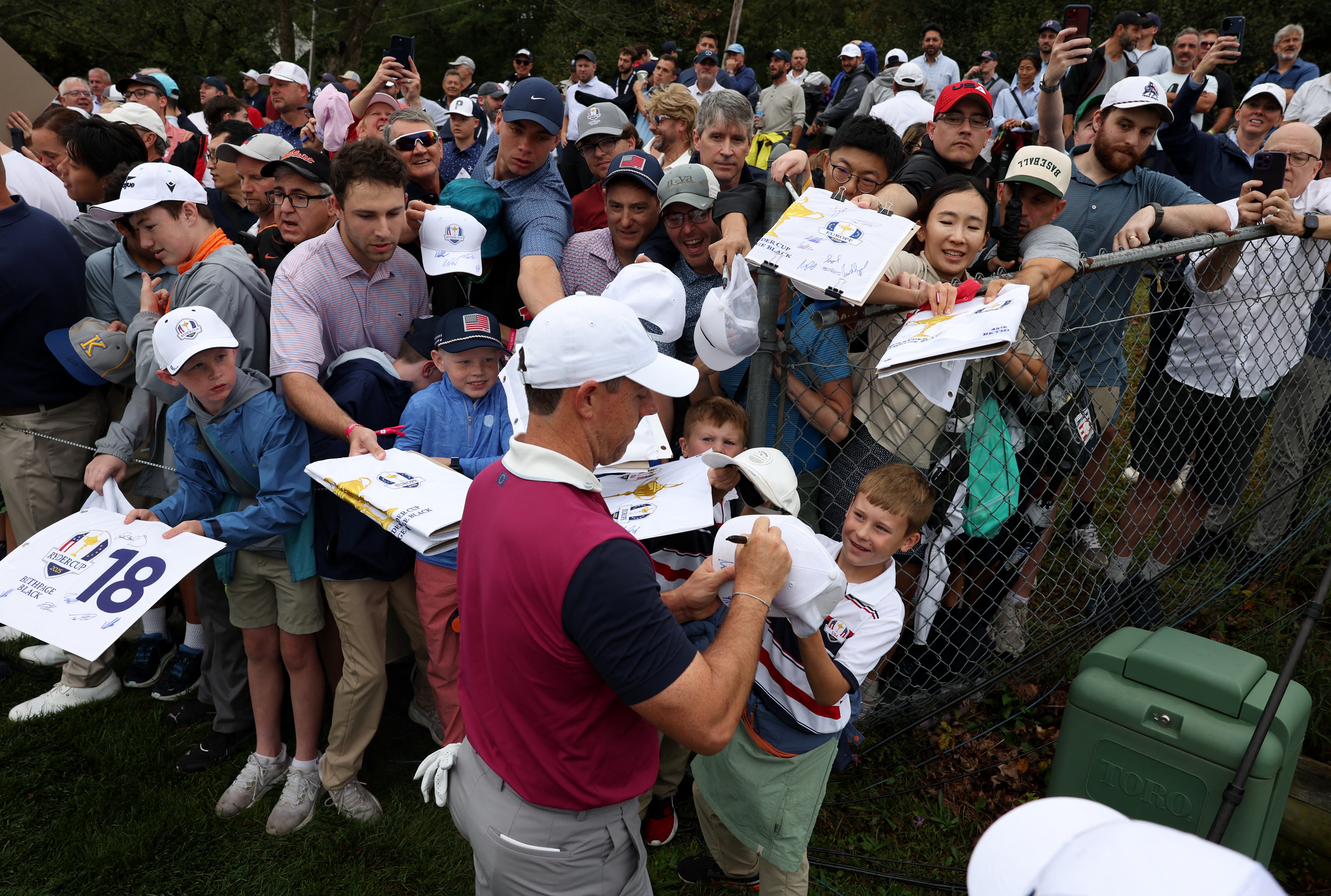 McIlroy signs autographs at Bethpage Black