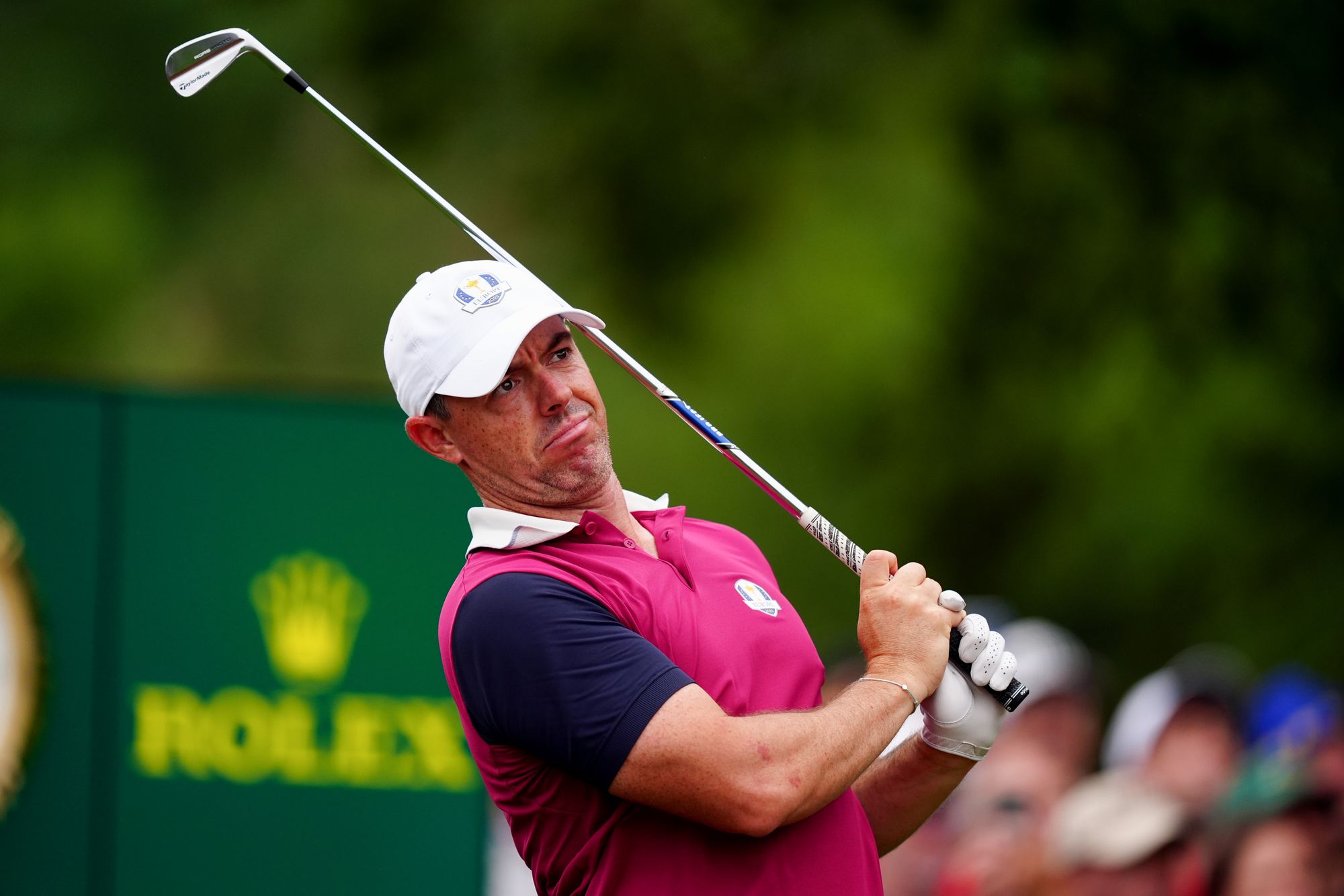 Rory McIlroy looks on after hitting an iron shot during practice on Thursday