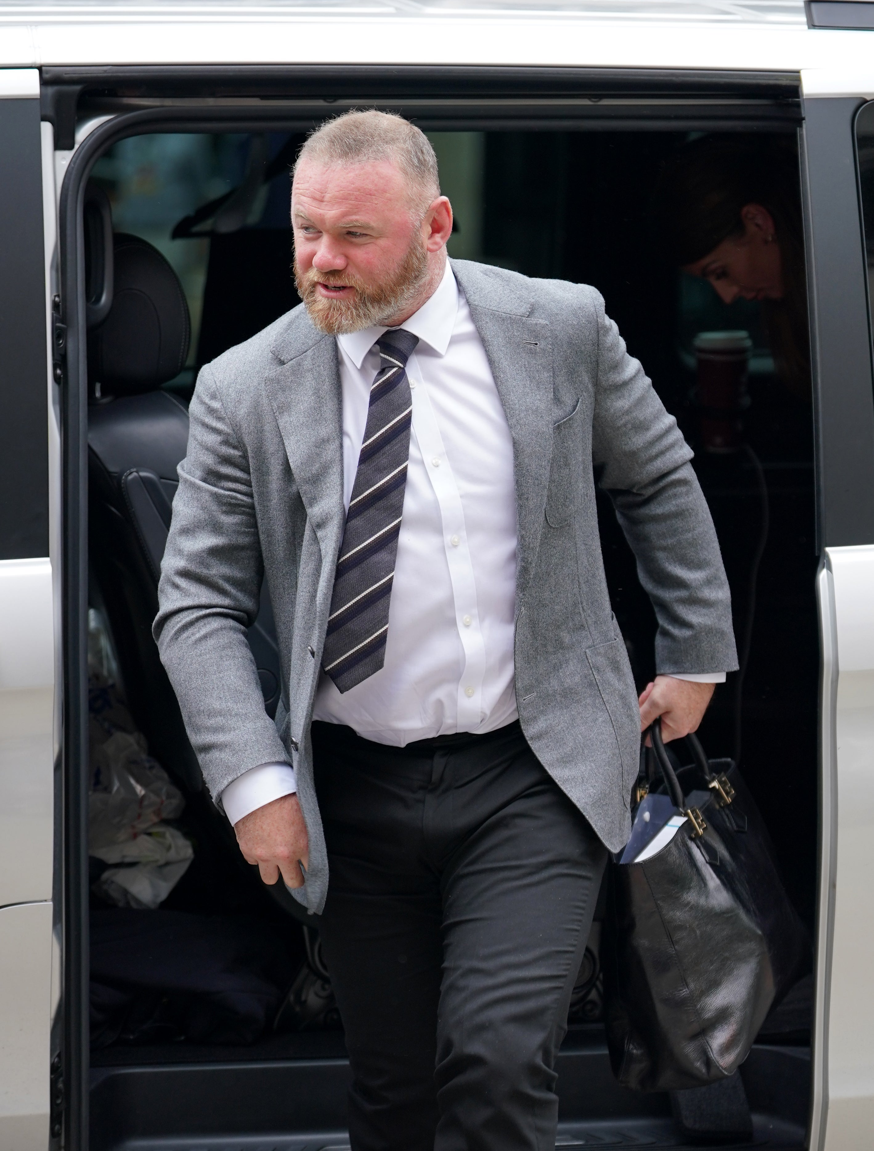 Rooney arrives at court to support his wife Coleen in her libel case against Rebekah Vardy in 2022. He has credited Coleen’s support with helping him through his darkest moments