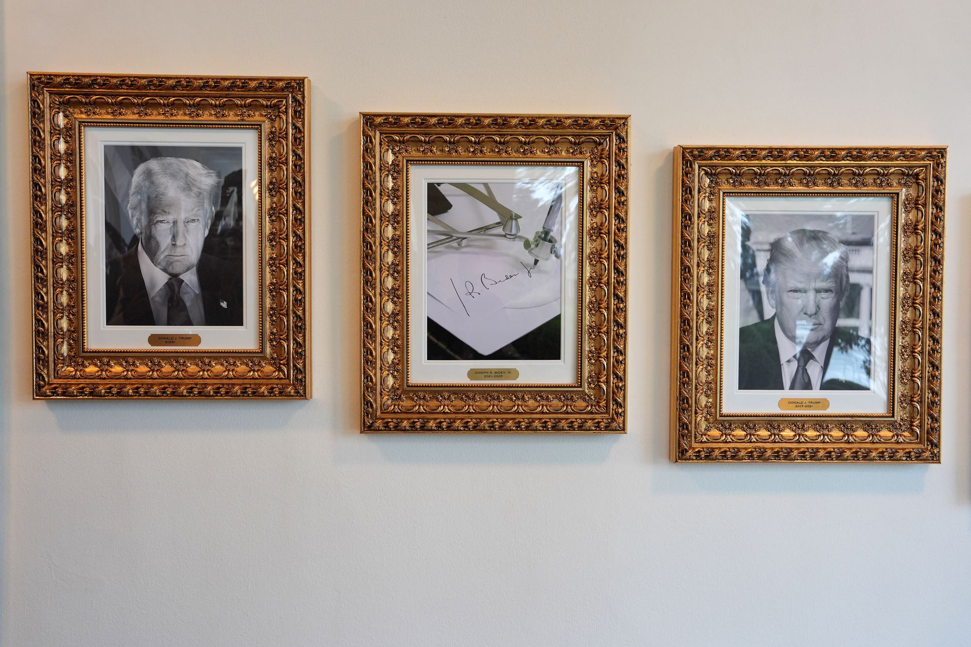 Trump has removed Biden’s official portrait from a presidential gallery display at the White House and replaced it with one of an autopen writing out his signature