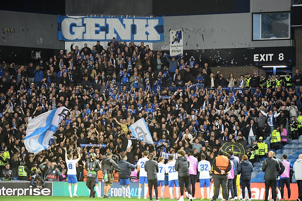 Genk celebrating their win over Rangers at Ibrox
