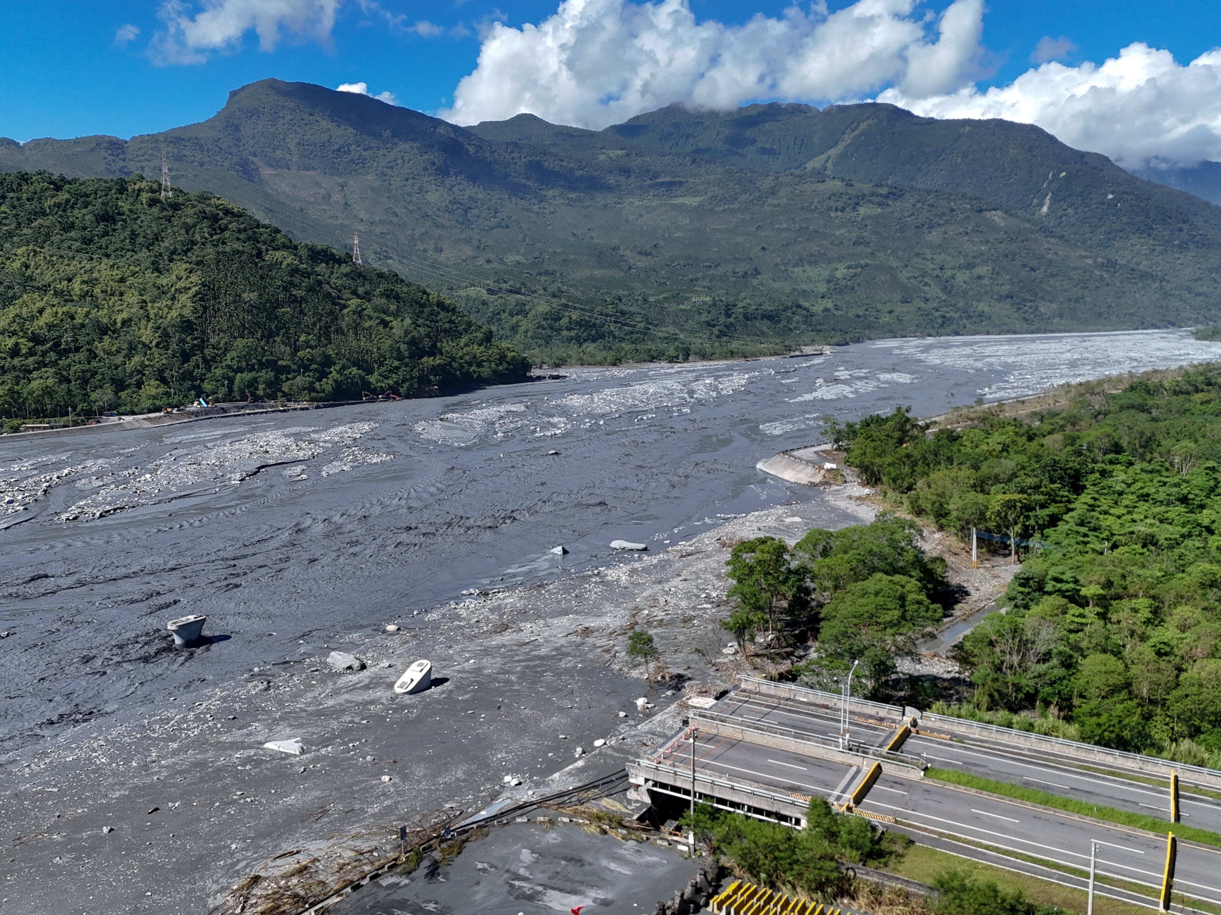 A drone view shows a collapsed bridge and flooded area, following Super Typhoon Ragasa, in Hualien, Taiwan, September 25, 2025
