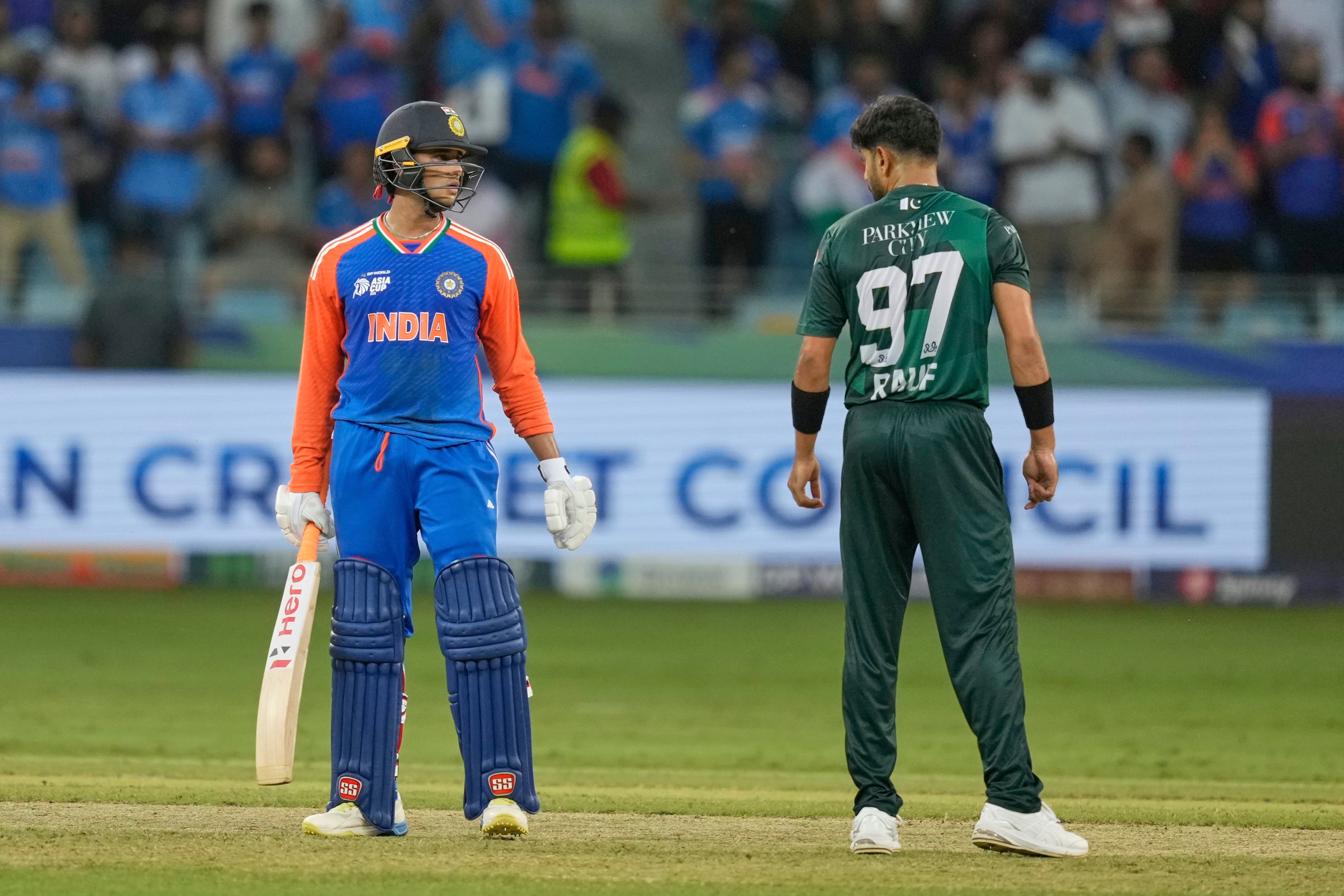 India’s Abhishek Sharma talks to Pakistan's Haris Rauf during the Asia Cup cricket match between India and Pakistan at Dubai International Cricket Stadium, United Arab Emirates, Sunday, 21 September 2025