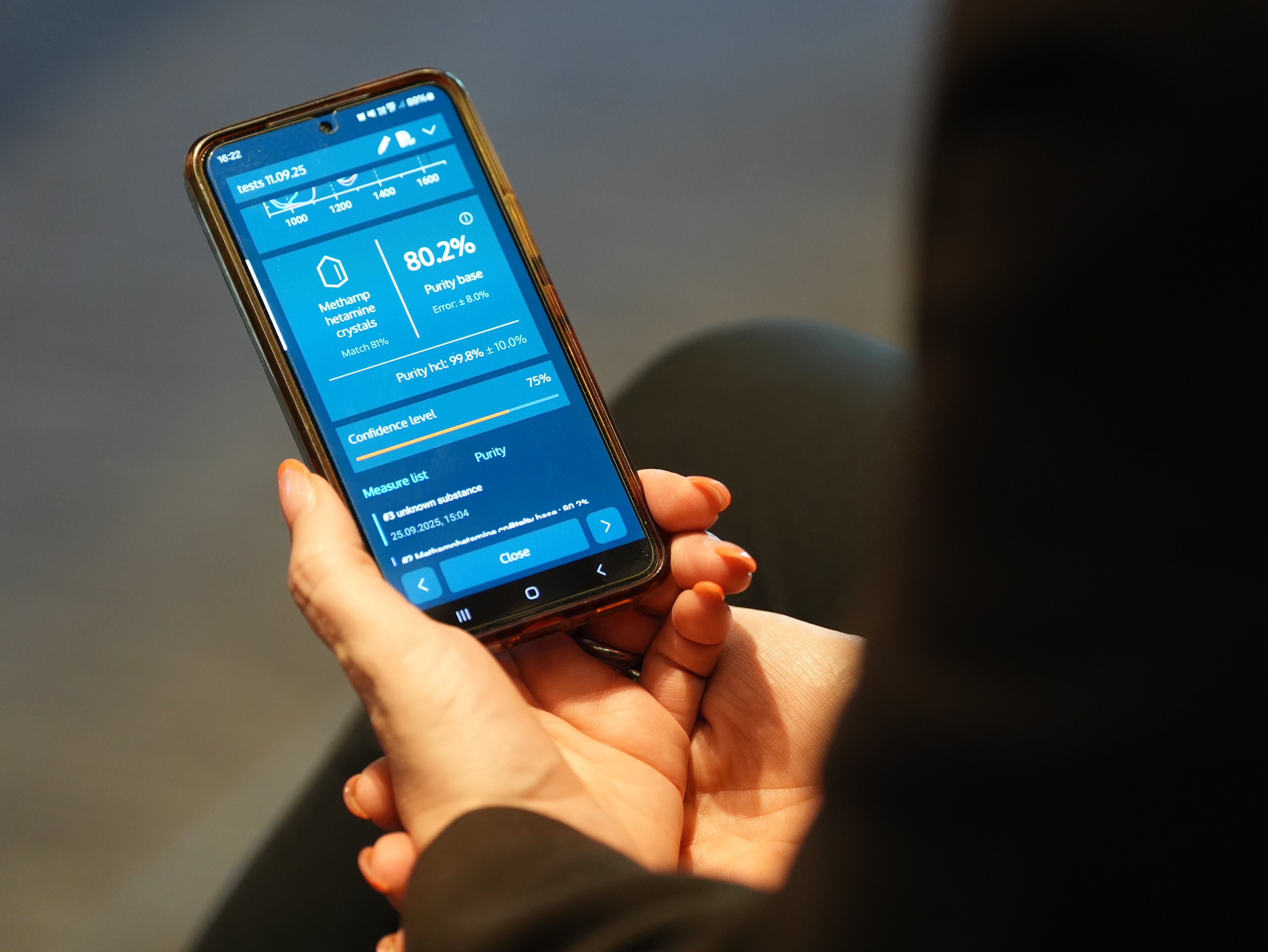 A mobile phone with an app that connects to a near infra-red detector that can test a range of powders and tablets