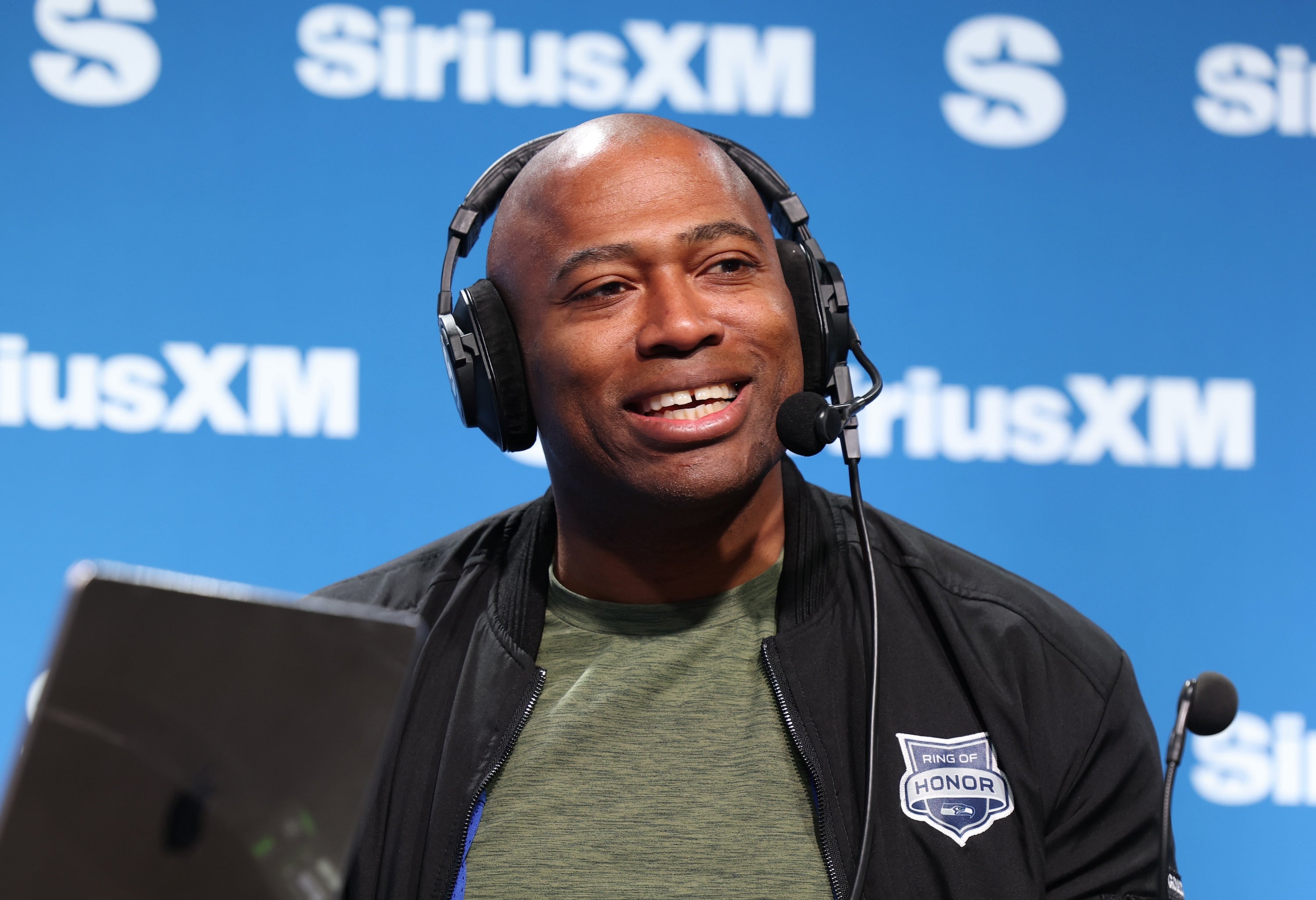 Shaun Alexander and his wife are expecting baby number 14