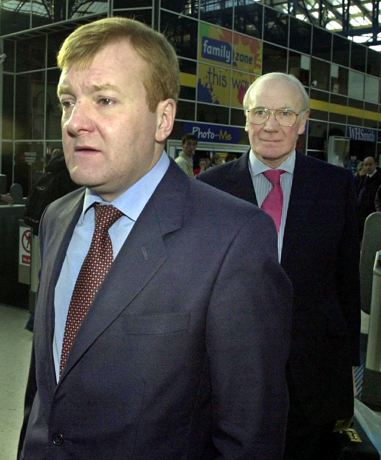 Menzies Campbell (right) with Lib Dem leader Charles Kennedy (Michael Stephens/PA)
