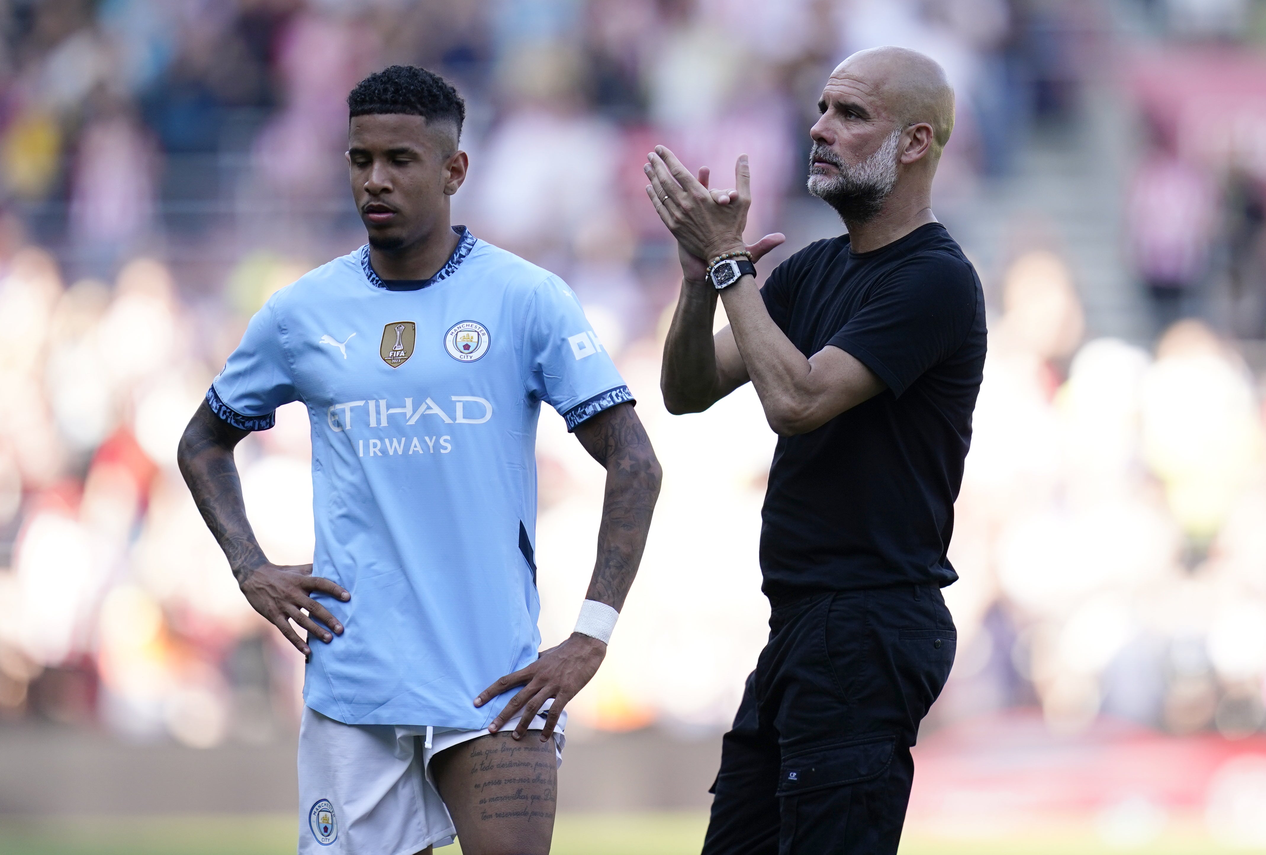 Savinho (left) has praised the impact of Pep Guardiola on his career