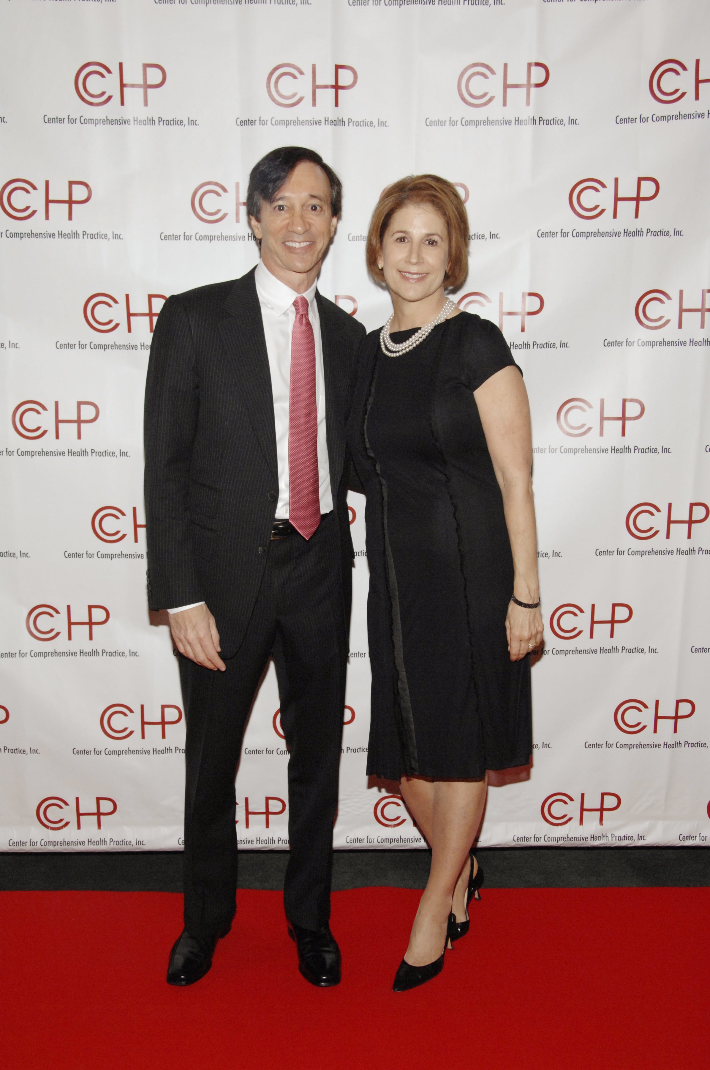 According to the indictment, Rubin, pictured with his wife Mary Henry, is accused of recruiting dozens of women to engage in sex acts with him from “at least” 2009 through 2019