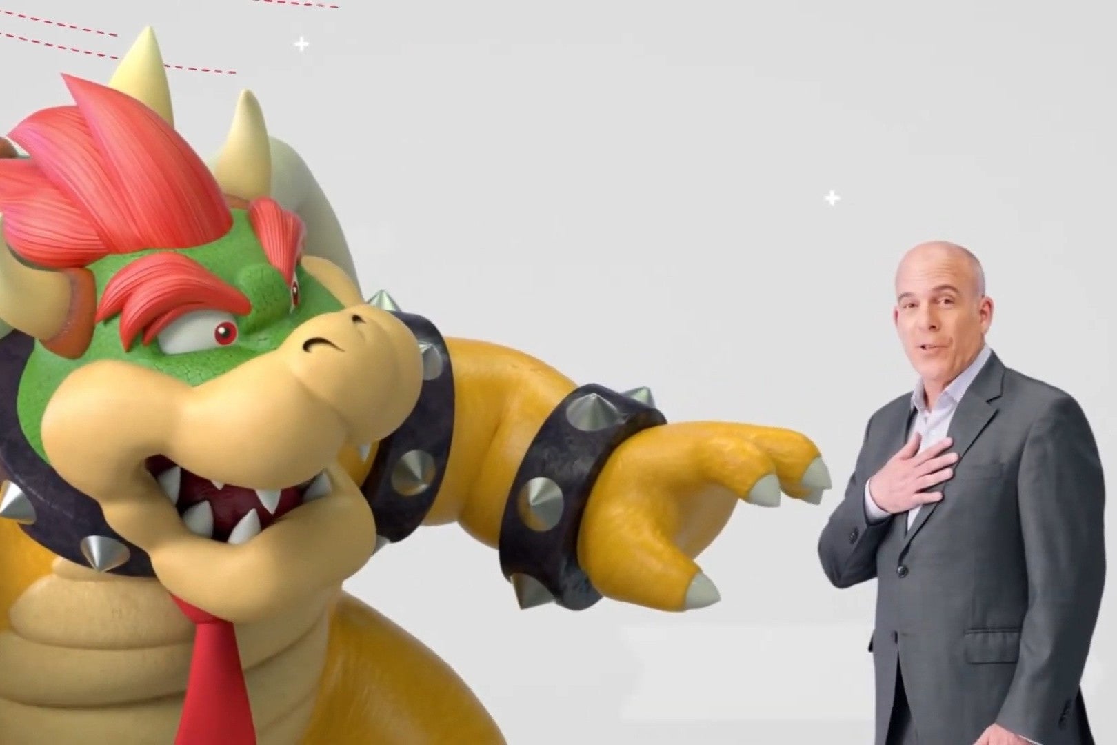 The video game villain Bowser alongside Nintendo of America boss Doug Bowser