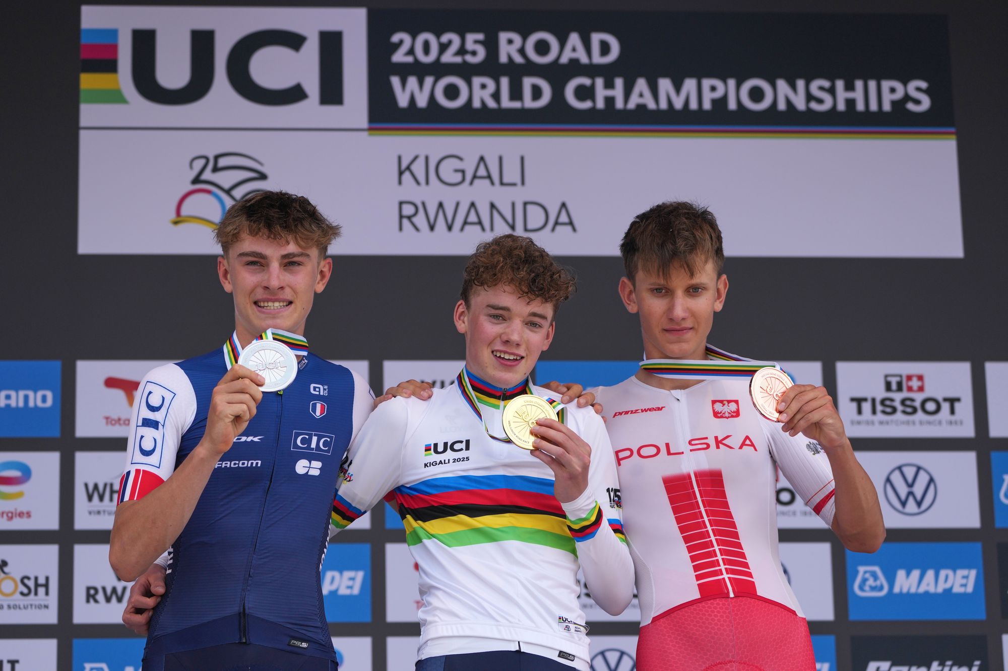 Britain's Harry Hudson, centre, with silver medallist France's Johan Blanc, left, and bronze medallist Poland's Jan Jackowiak