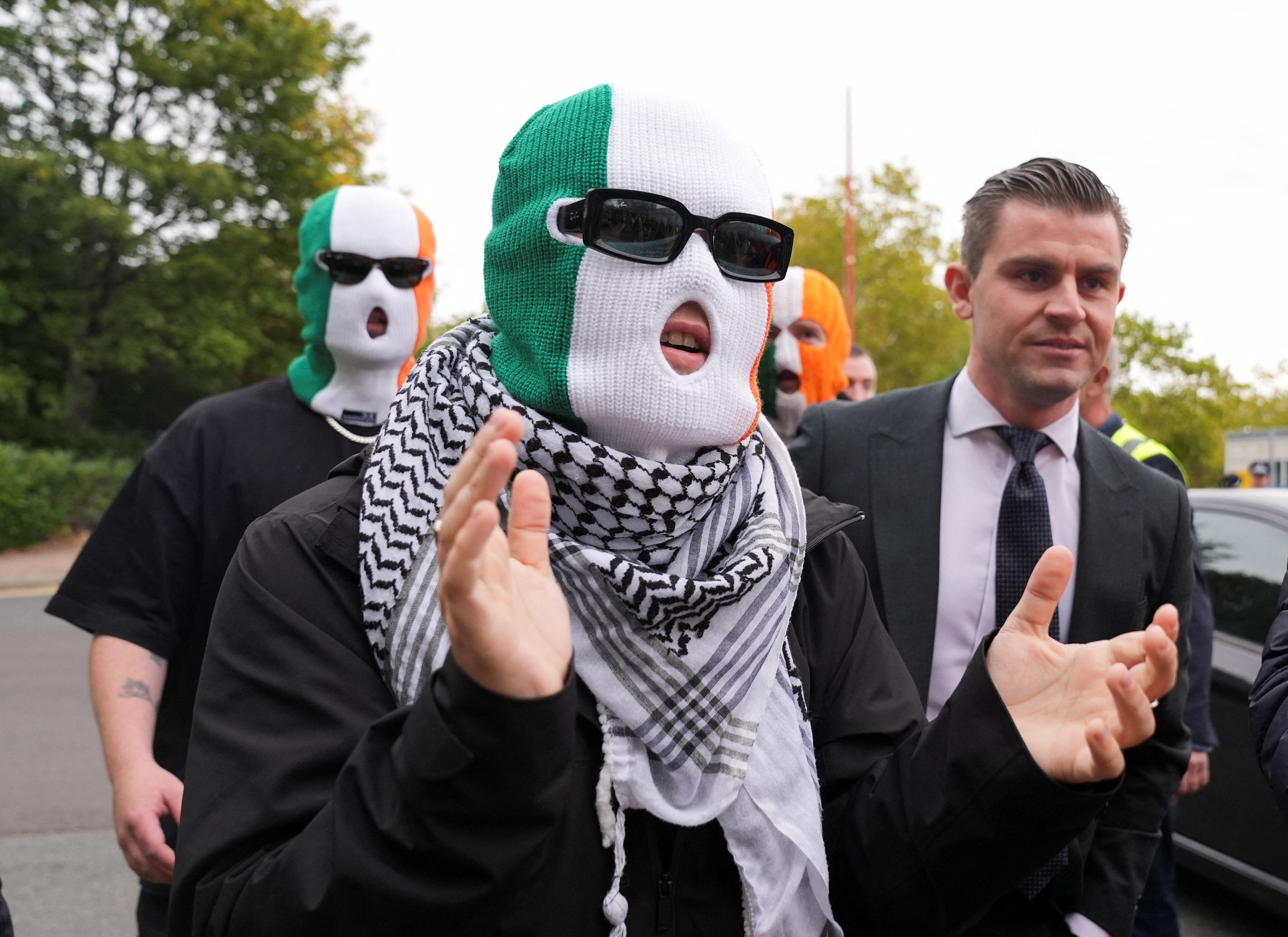 Liam Óg Ó hAnnaidh, centre, outside the Woolwich Crown Court on Friday