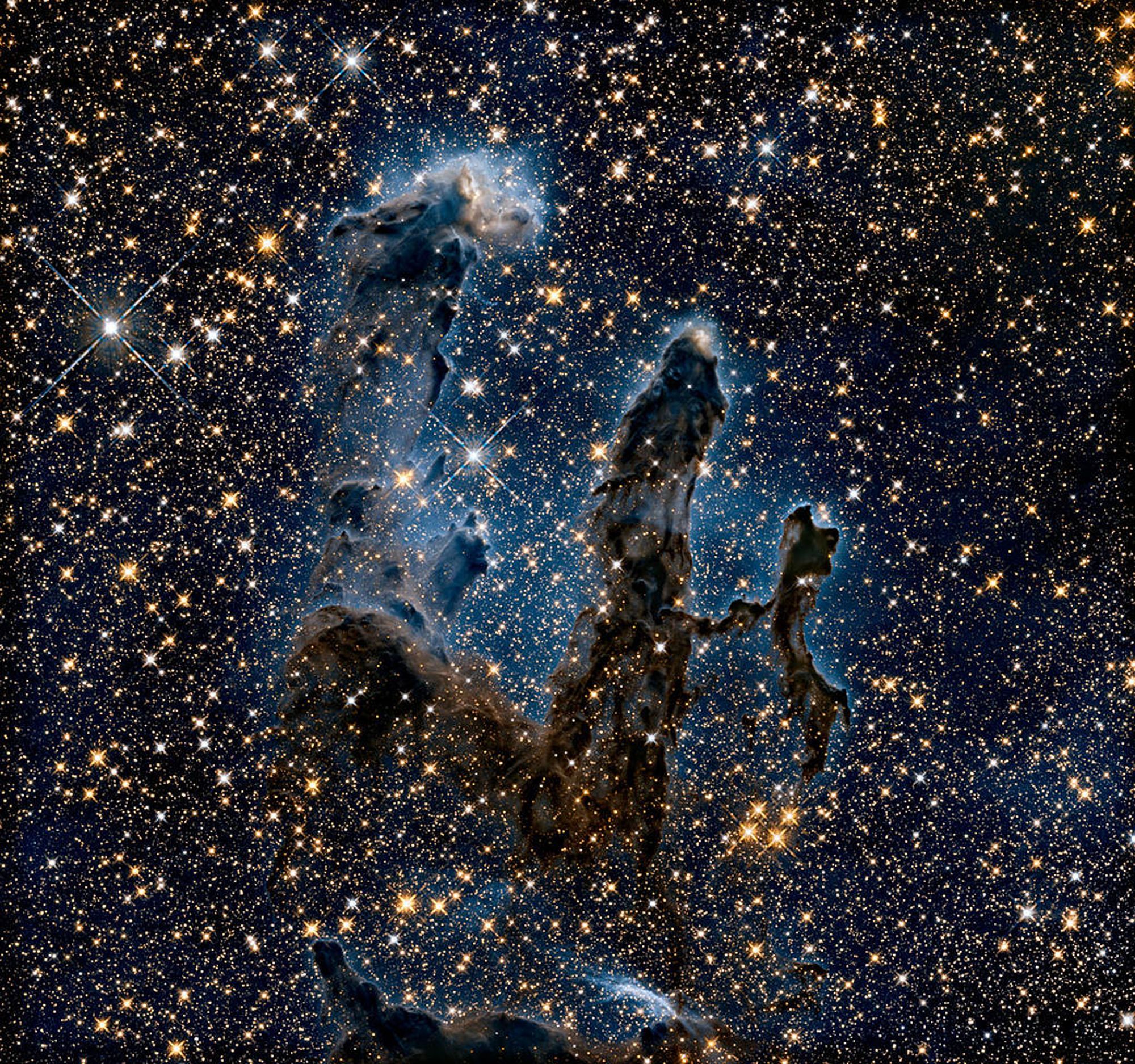 The Eagle Nebula's Pillars of Creation, captured in infrared