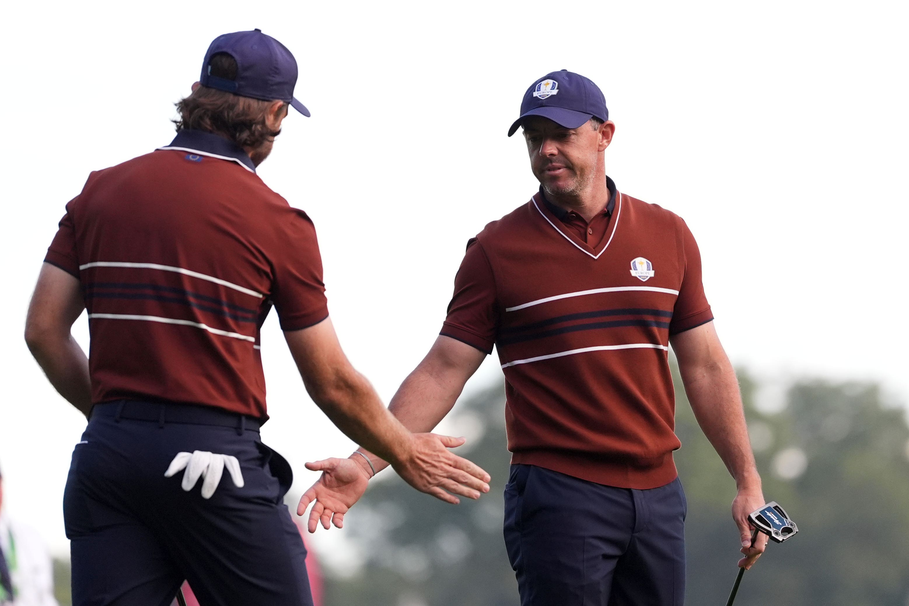 Rory McIlroy, right, and Tommy Fleetwood again produced the goods for Europe (Lindsey Wasson/AP)