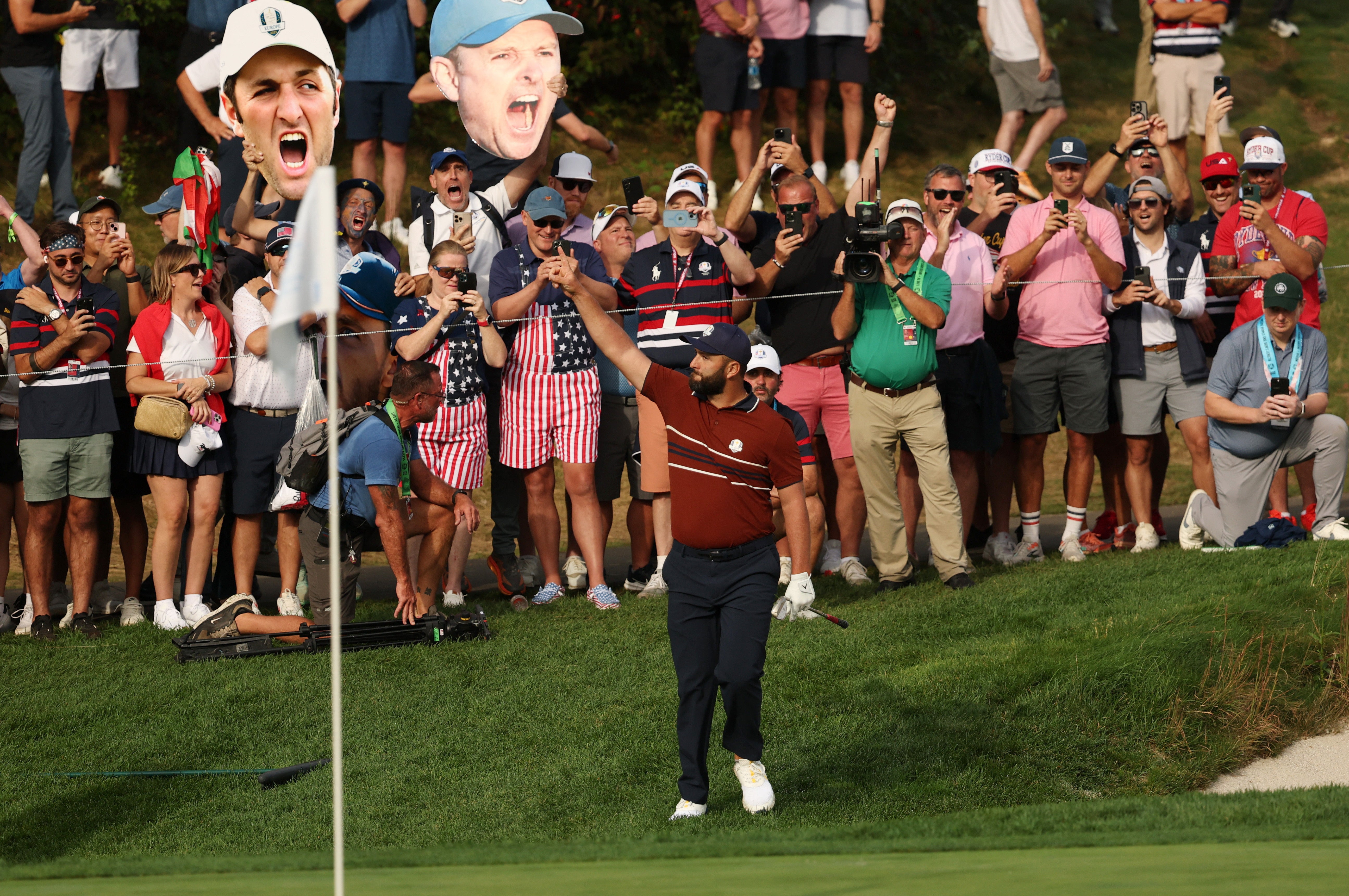 Jon Rahm celebrated after chipping in on the 8th hole